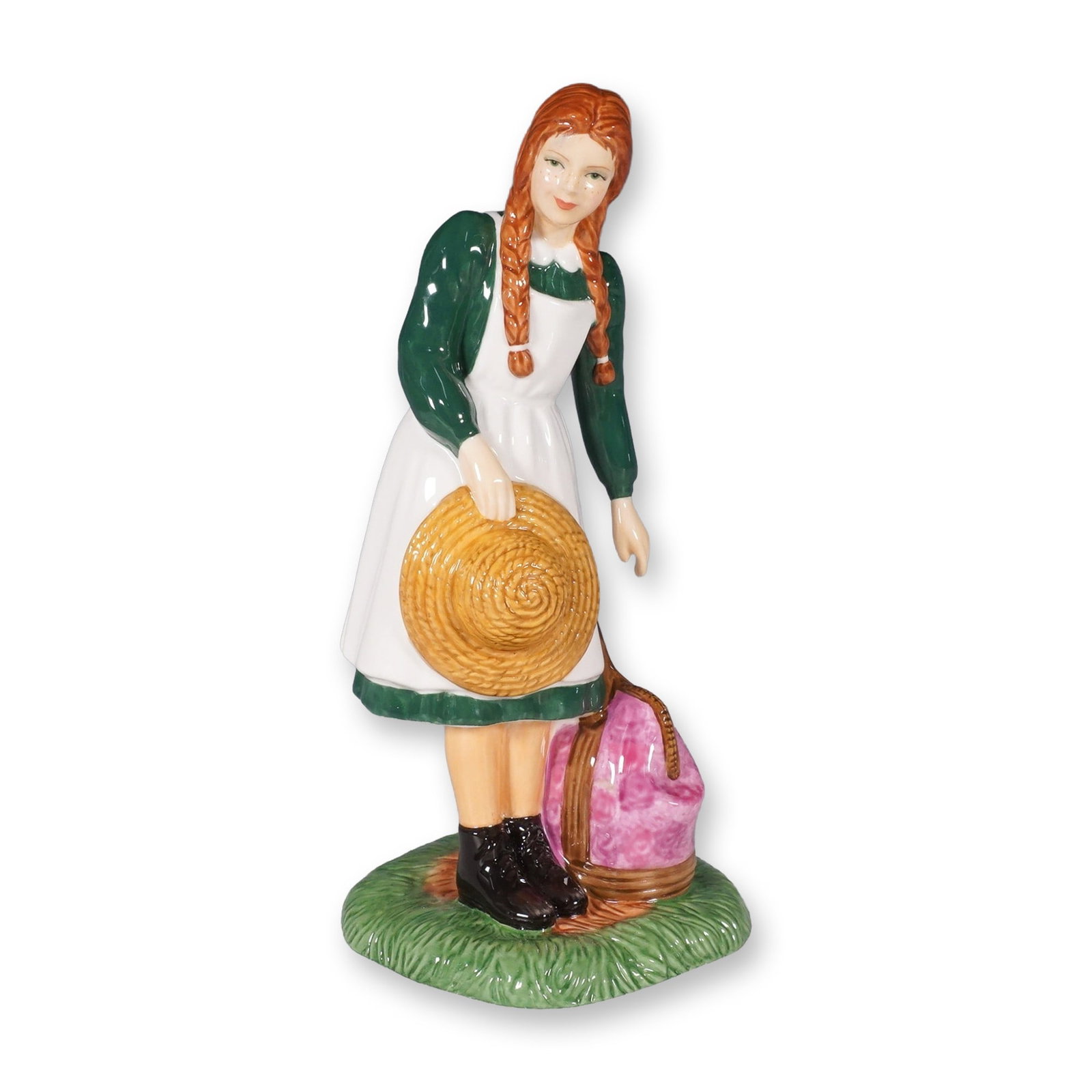 Royal Doulton Figurine, Anne Arrives at Green Gables HN5225: Inspired by the timeless story of Anne of Green Gables, this Royal Doulton figurine captures Anne Shirley's arrival at her new home. Designed by Nada Pedley, this limited edition piece is meticulously
