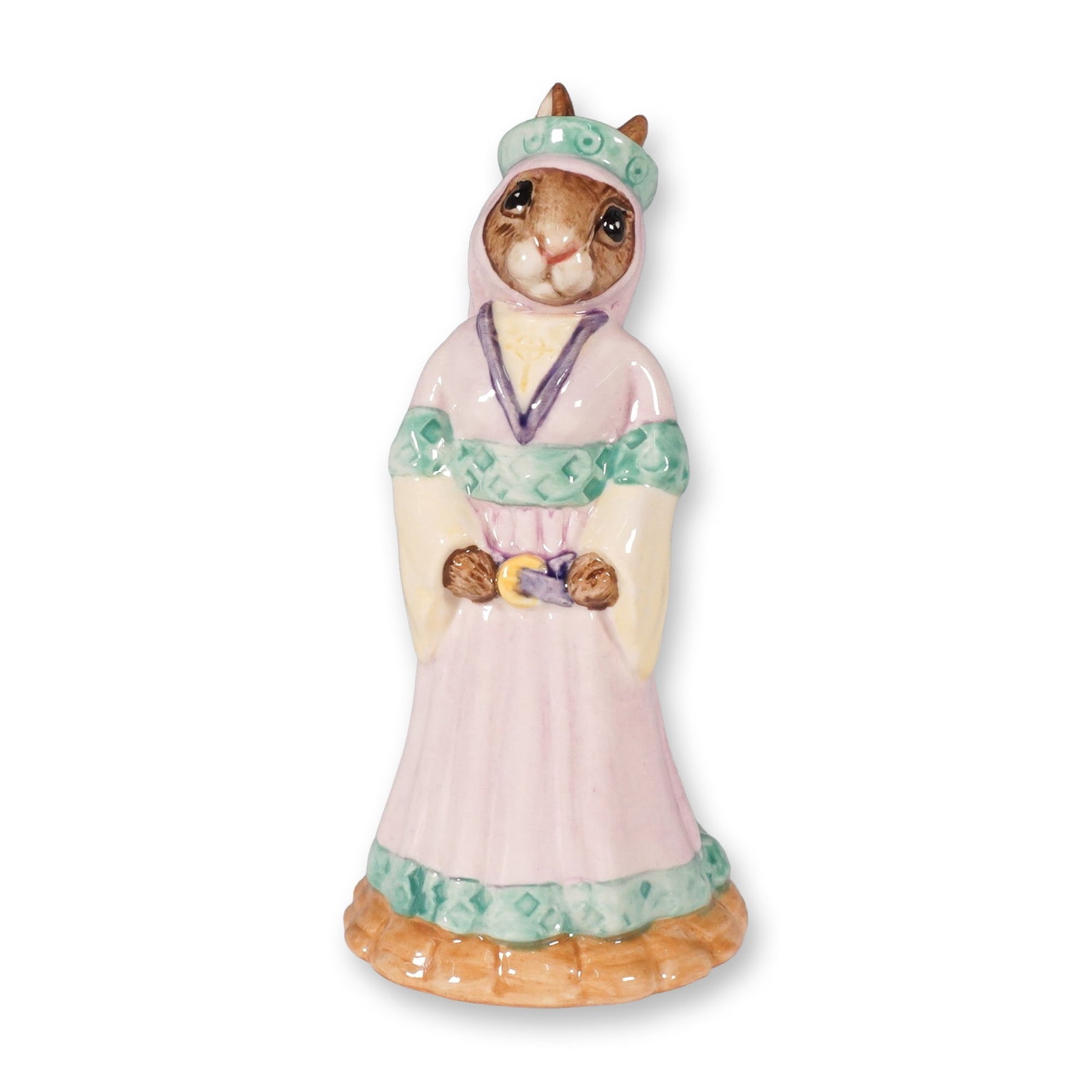 Royal Doulton Bunnykins Figurine, Maid Marion DB245: This Royal Doulton Bunnykins figurine, Maid Marion DB245, is part of the Robin Hood Collection. Handcrafted from fine bone china, this charming piece depicts Maid Marion in a flowing pink gown with gr