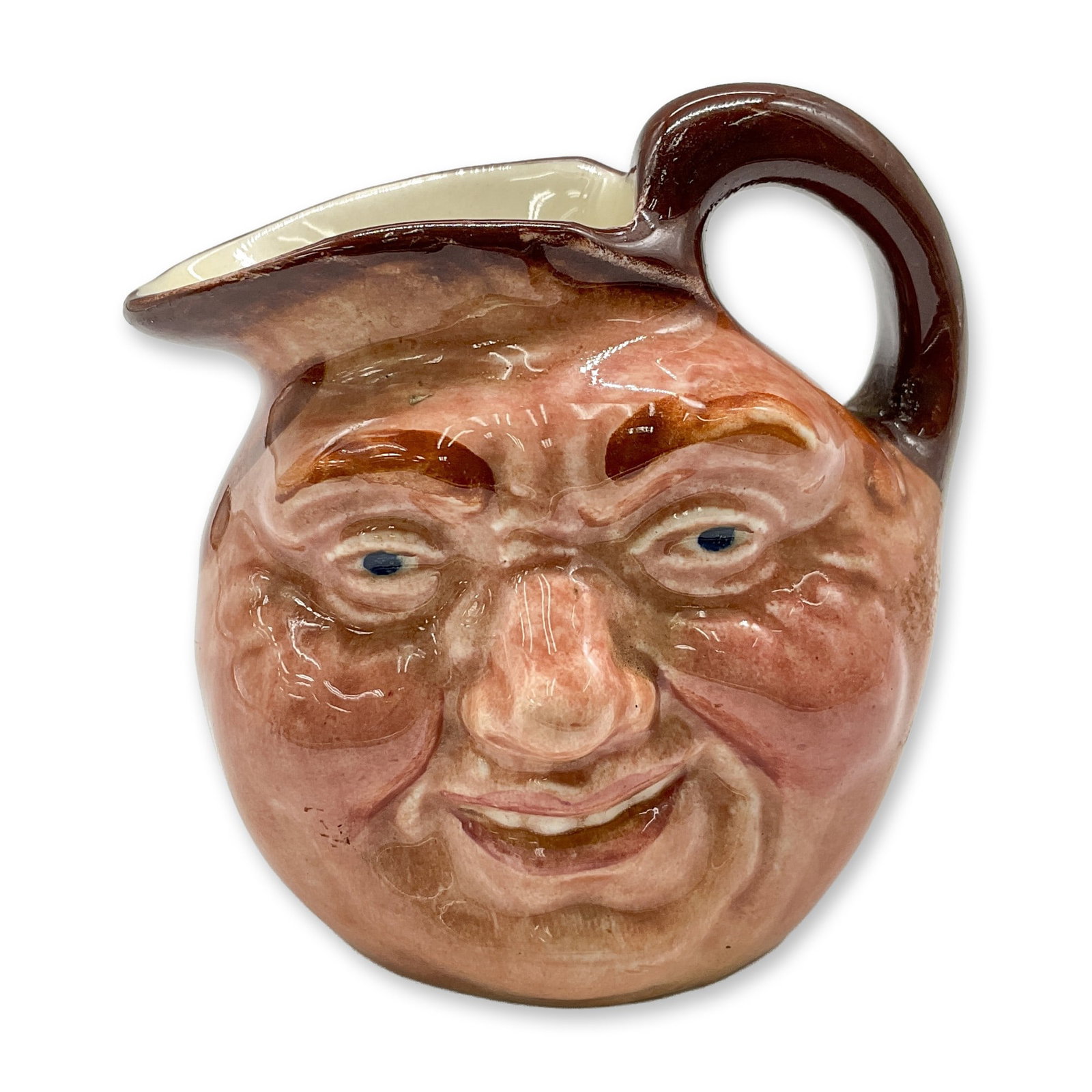 John Barleycorn D6041 - Mini - Royal Doulton Character Jug: Style One, handle inside jug. Brown rim with light brown body. Royal Doulton backstamp. Artist: Charles J. Noke Dimensions: 2.5"H Date or Era: Unknown Manufacturer or Brand: Royal Doulton Country