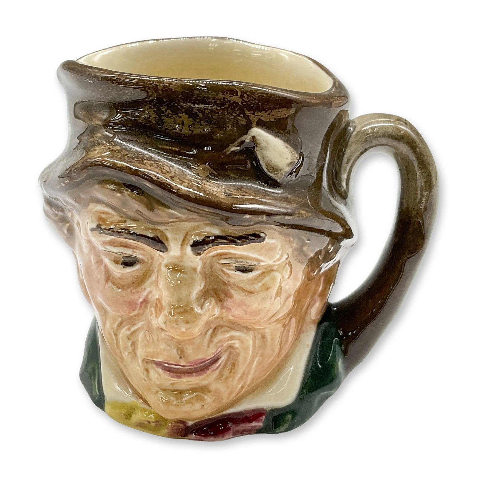 Paddy D6042 - Mini - Royal Doulton Character Jug: Brown hat; green coat; yellow and red scarf. Royal Doulton backstamp. Artist: Harry Fenton Dimensions: 2.25"H Date or Era: 1939 - 1960 Manufacturer or Brand: Royal Doulton Country of Origin: