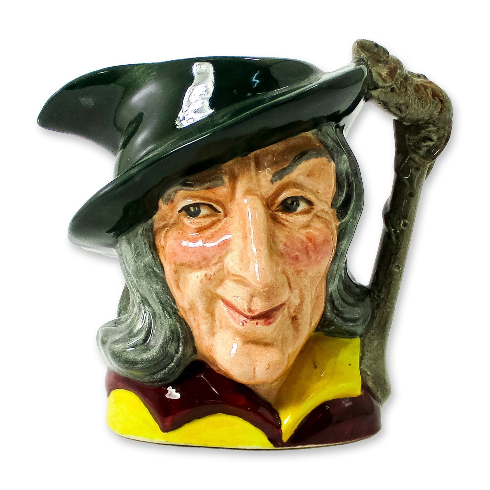 Pied Piper D6462 - Small - Royal Doulton Character Jug: Green cap; maroon and yellow tunic; brown hair. In German legend, a stranger came to the town of Hamelin and told the mayor he would rid the village of rats for a sum of money. The Pied Piper walked t