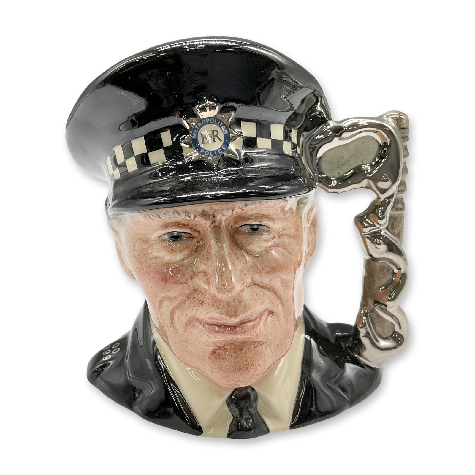 Policeman D6852 - Small - Royal Doulton Character Jug: Black and white coloration. Royal Doulton backstamp. Artist: Stanley J. Taylor Dimensions: 4"H Date or Era: 1989 Edition Number and/or Size: 3044 of 5000 Manufacturer or Brand: Royal Doulton<