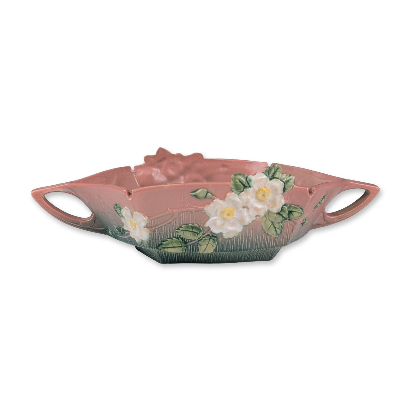 Roseville Pottery Console Bowl, White Rose Pink: Roseville Pottery White Rose console bowl in matte glazed earthenware. The vessel features relief-molded white blossoms with yellow centers and green foliage set against a textured, vertically striate