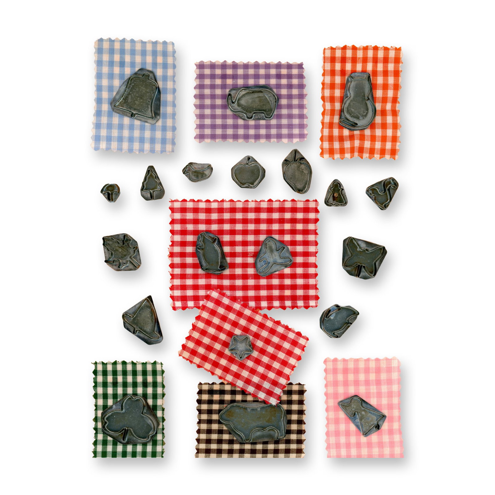 A CARD OF REALISTIC SHAPED METAL BUTTONS (1 of 3)