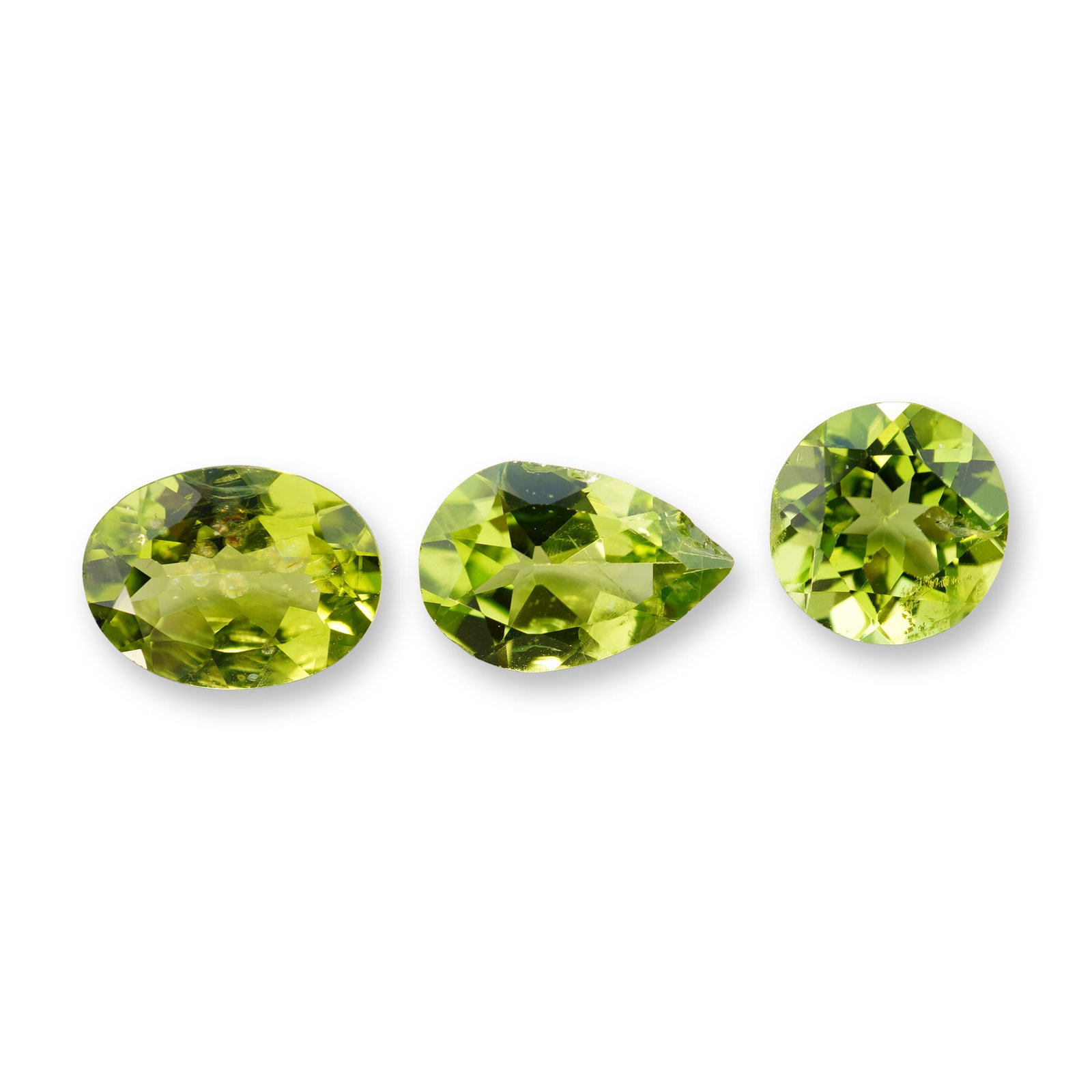 3pc Oval, Round and Pear Shape Peridot Gemstones: Beautiful grouping of 3Peridot stones. A green round peridot is a vibrant, August birthstone renowned for its unique single-color profile-ranging from bright lime to deep olive green.Tested with Presi