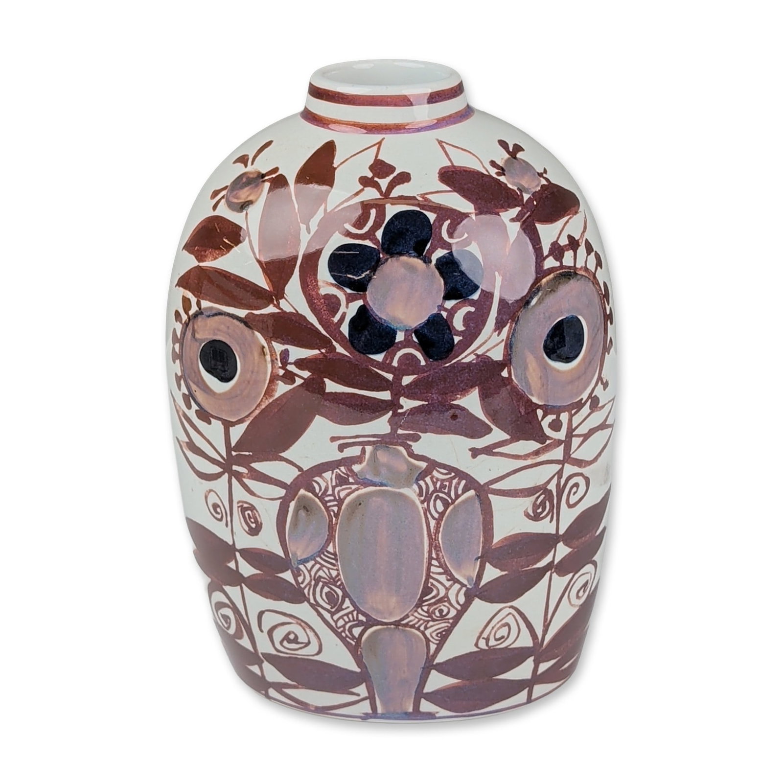 Royal Copenhagen Kari Christensen Faience Baca Vase: The ovoid earthenware body features stylized modernist decoration of a bird, floral elements, and abstract foliage in a palette of chocolate brown, plum, and indigo glazes against a white ground. The 