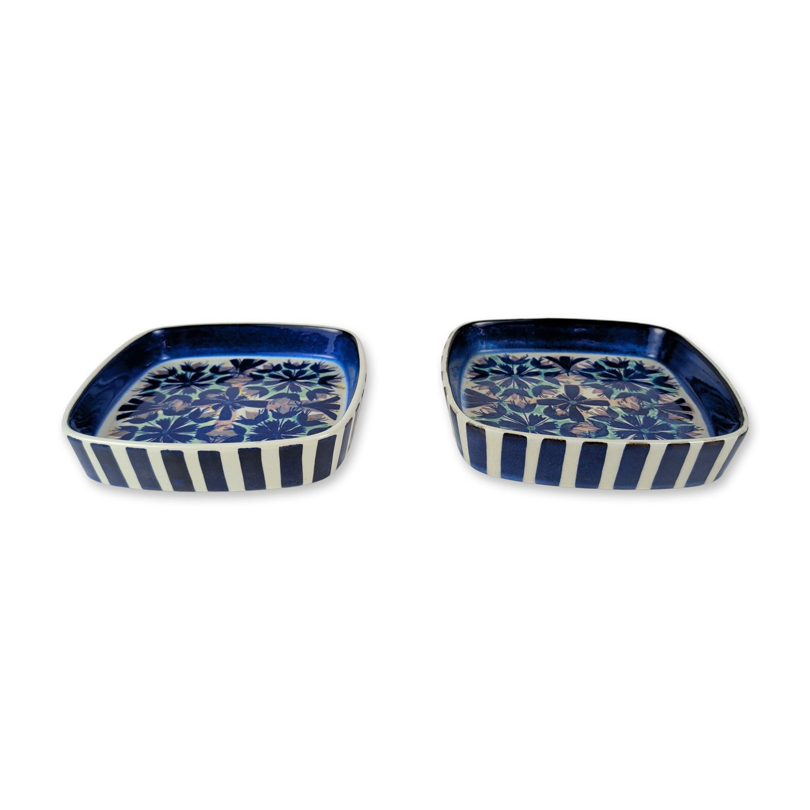 2pc Royal Copenhagen Marianne Johnson Tenera Fajance Dishes: Two Royal Copenhagen Tenera series fajance dishes designed by Marianne Johnson, circa 1960s. Square earthenware dishes with rounded corners and flared sides, featuring hand-painted stylized floral