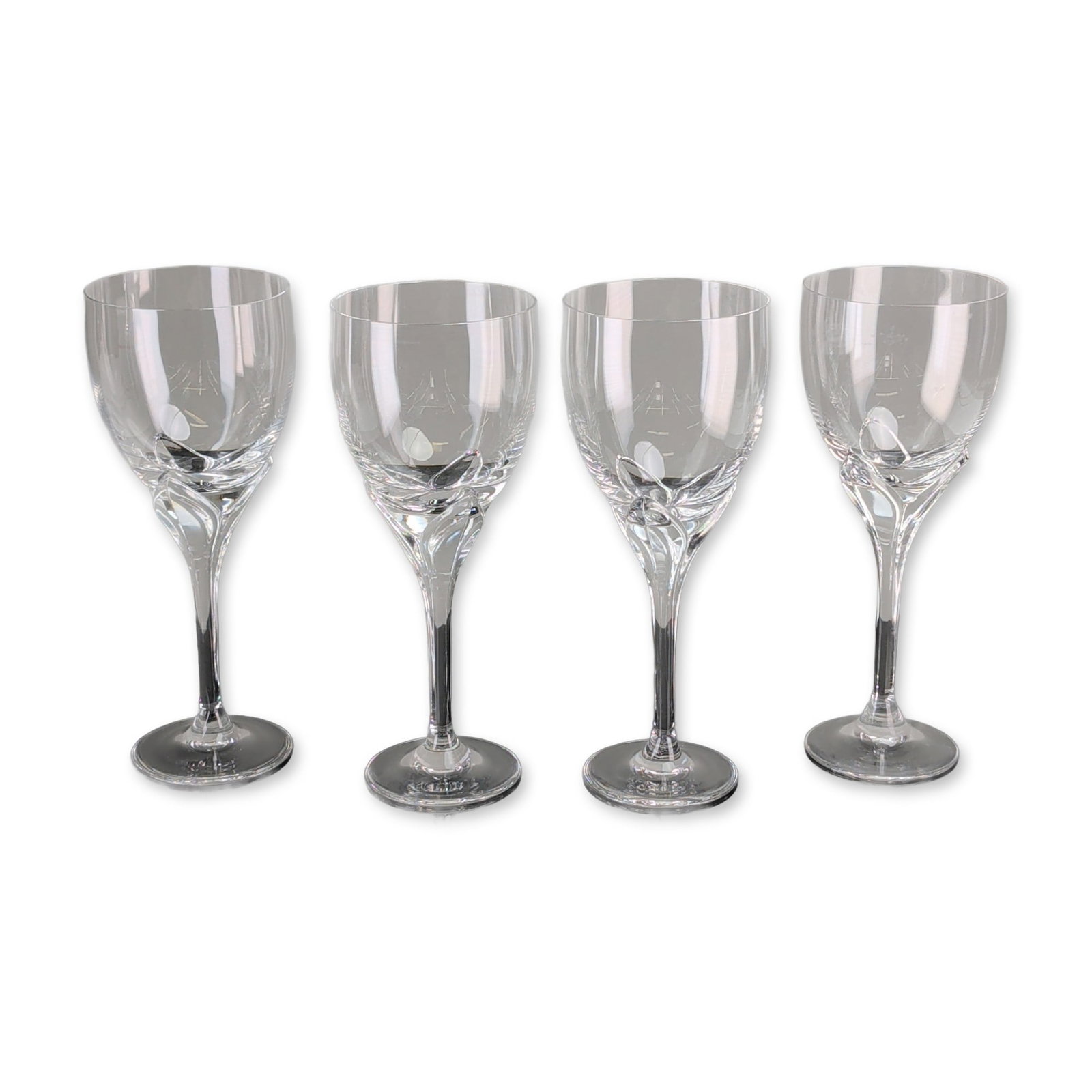 4pc Rosenthal Studio-Linie Iris Crystal Wine Glasses: Set of four German Rosenthal Studio-Linie crystal wine glasses in the Iris pattern, designed by Michael Boehm and Claus Josef Riedel. The goblets feature a sculptural pulled stem characterized by