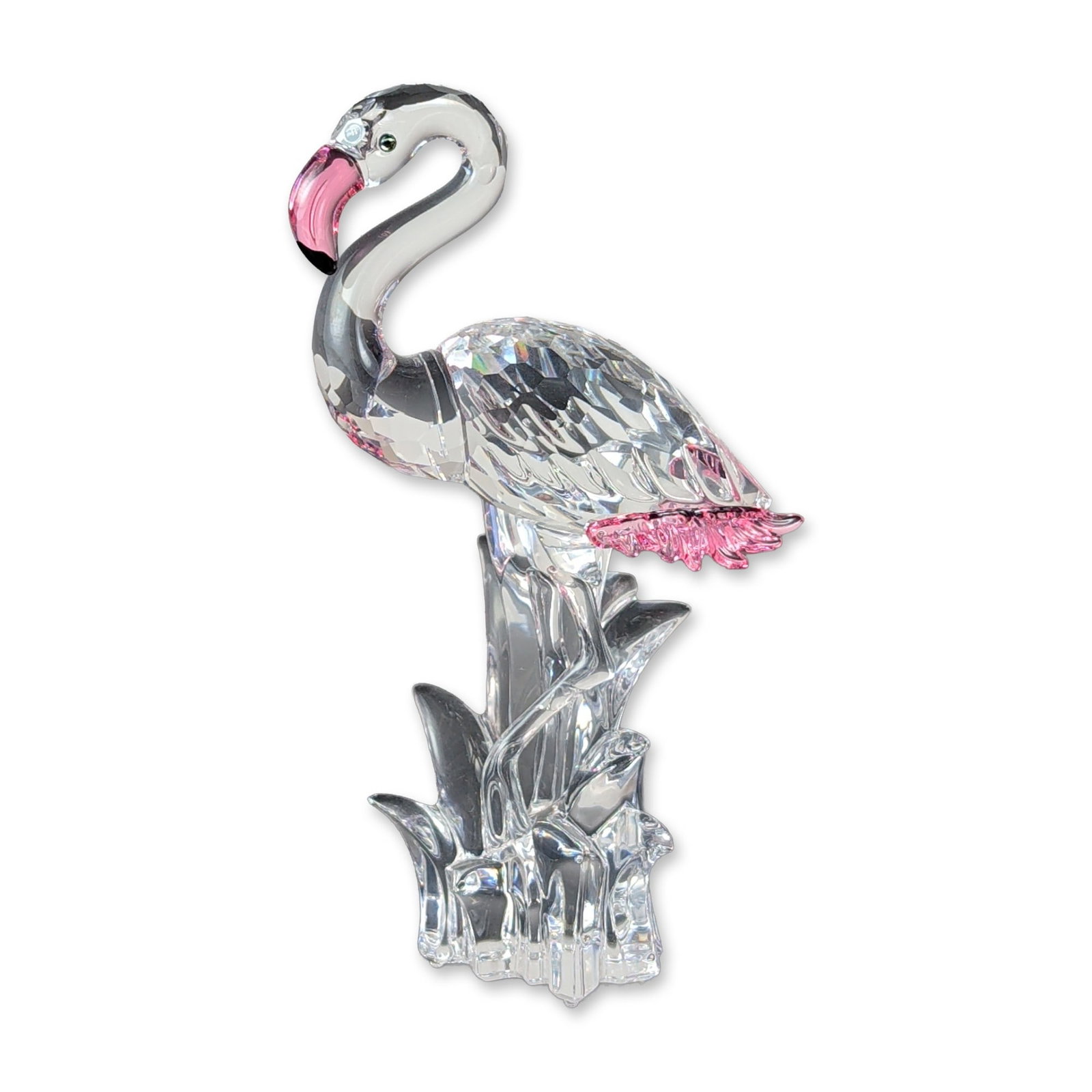 Swarovski Crystal Flamingo with Pink Feathers: Swarovski faceted lead crystal flamingo figurine featuring a clear faceted body and neck, with pink crystal accents to the beak and tail feathers and Moroda eyes. The bird stands on a clear crystal ba