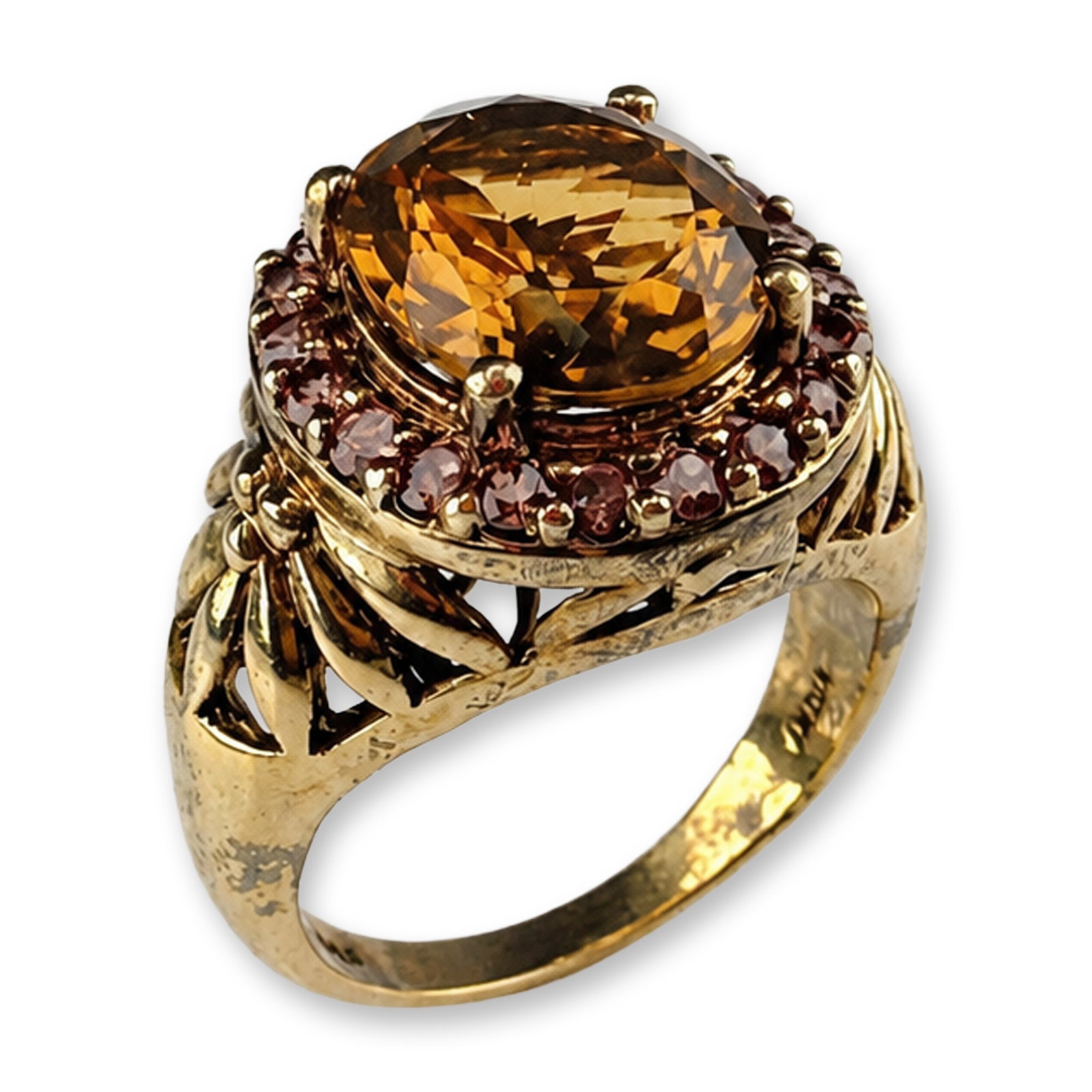 Indian Gold-Plated Citrine and Spinel Cocktail Ring: Indian cocktail ring in gold-plated, featuring a central oval cut faceted yellow citrine within a halo of small round cut faceted pink spinels. The center stone is held in a four prong setting above a