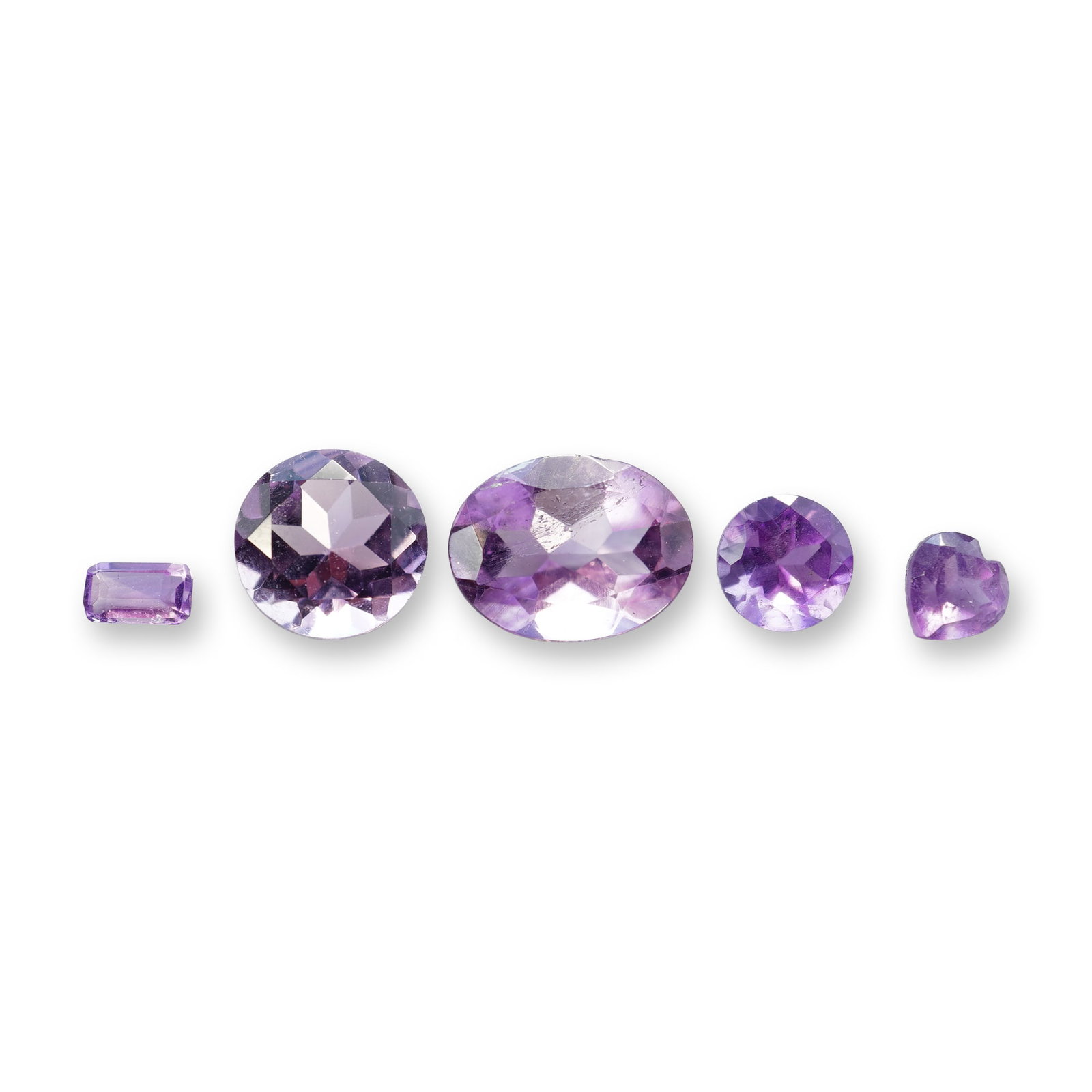 5pc Purple Amethyst Gemstones in Various Shapes and Sizes: Grouping of 5 purple amethyst gemstones. Amethyst is the traditional birthstone for the month of February. it is best known for relieving stress, promoting restful sleep, and enhancing spiritual