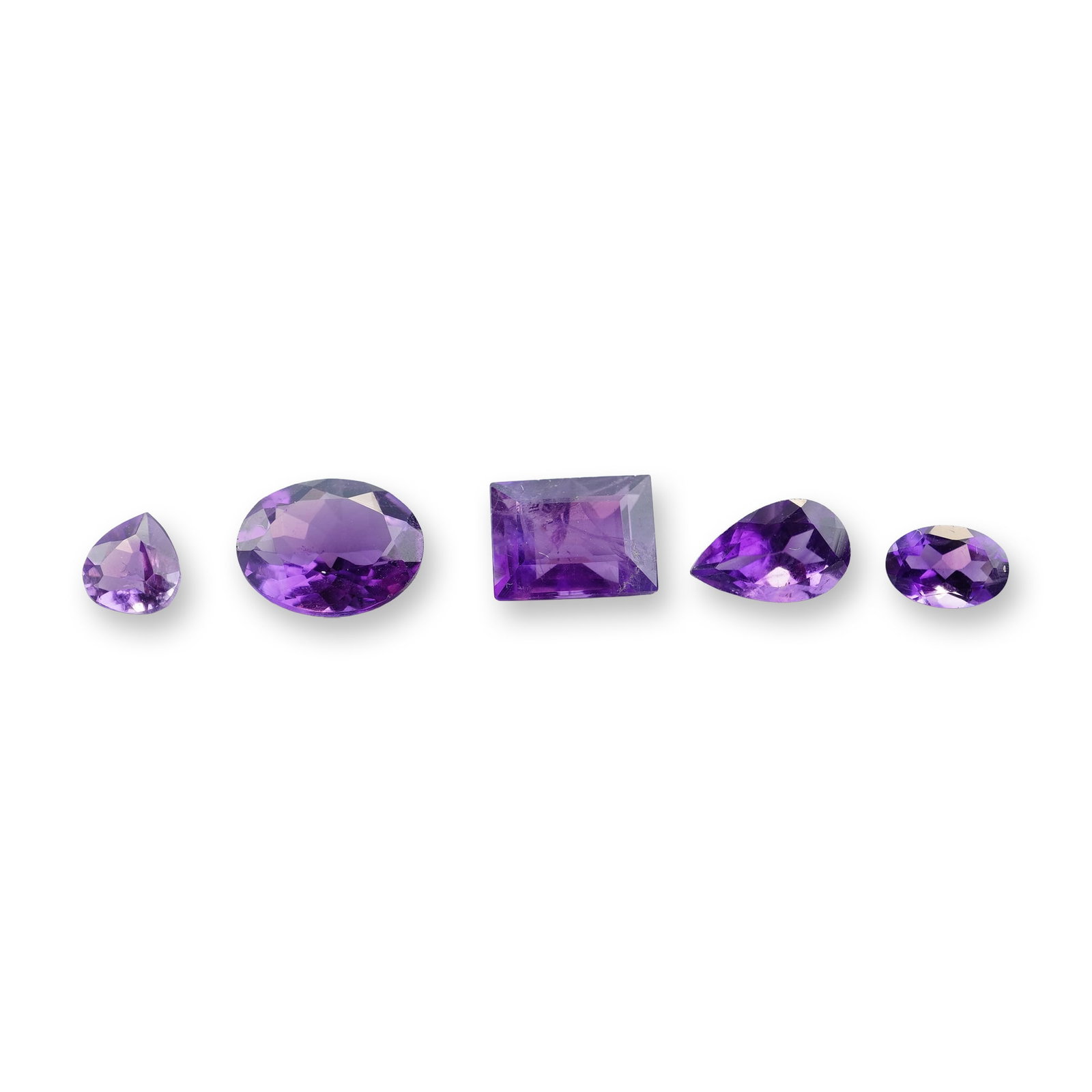 5pc Purple Amethyst Gemstones in Various Shapes and Sizes: Grouping of 5 purple amethyst gemstones. Amethyst is the traditional birthstone for the month of February. it is best known for relieving stress, promoting restful sleep, and enhancing spiritual