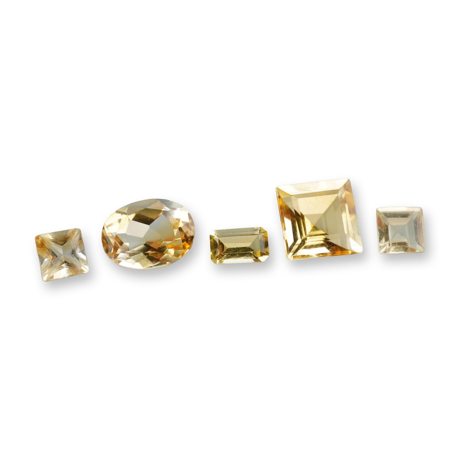 5pc Citrine Gemstones in Various Shapes and Sizes: Set of 5 Citrine stones. Citrine is a sunny, golden variety of quartz prized for manifesting abundance, boosting self-confidence, and clearing negative energy. Often called the "Merchant's Stone," it