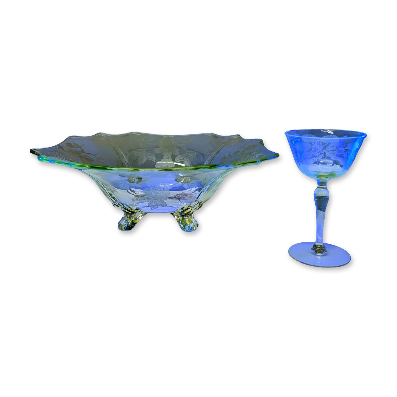 2pc Depression Era Uranium Etched Champagne Coupe and Footed Centerpiece Bowl: Two pieces of American elegant glassware dating to the Depression era, crafted from citron-colored yellow uranium glass that exhibits a vibrant green fluorescence. The lot consists of a footed centerp