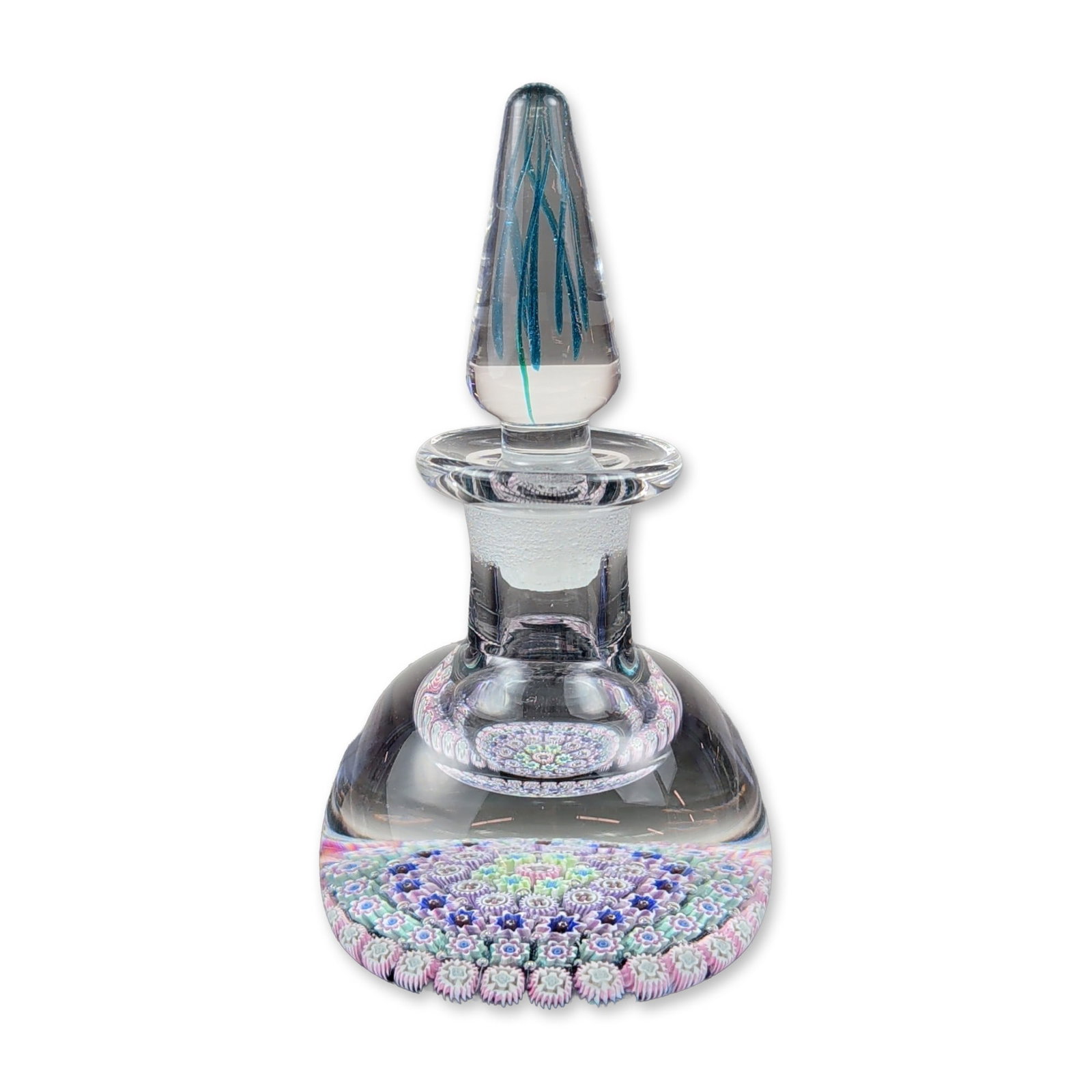 Perthshire Millefiori Art Glass Scent Bottle with Stopper: Perthshire Paperweights scent bottle, manufactured in Crieff, Scotland, circa 1980-1991. The vessel is constructed of clear blown glass with a wide, rounded shoulder and a concentric millefiori paperw