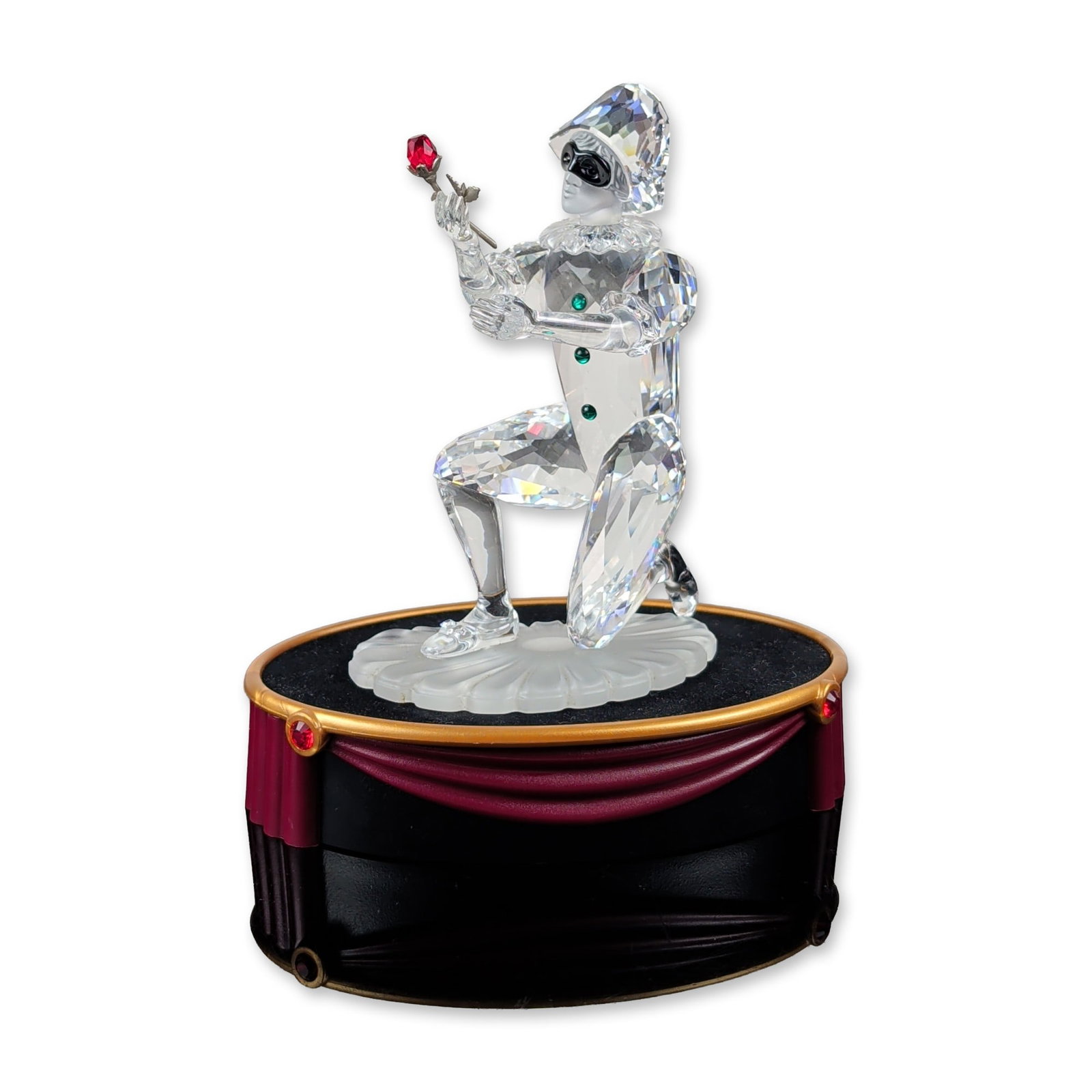 Swarovski 2001 SCS Pierrot Crystal Figurine: Swarovski Crystal Society 2001 Annual Edition Pierrot figurine from the Masquerade trilogy. Lead crystal figure in a kneeling pose featuring a clear faceted body and hat with frosted crystal face, han