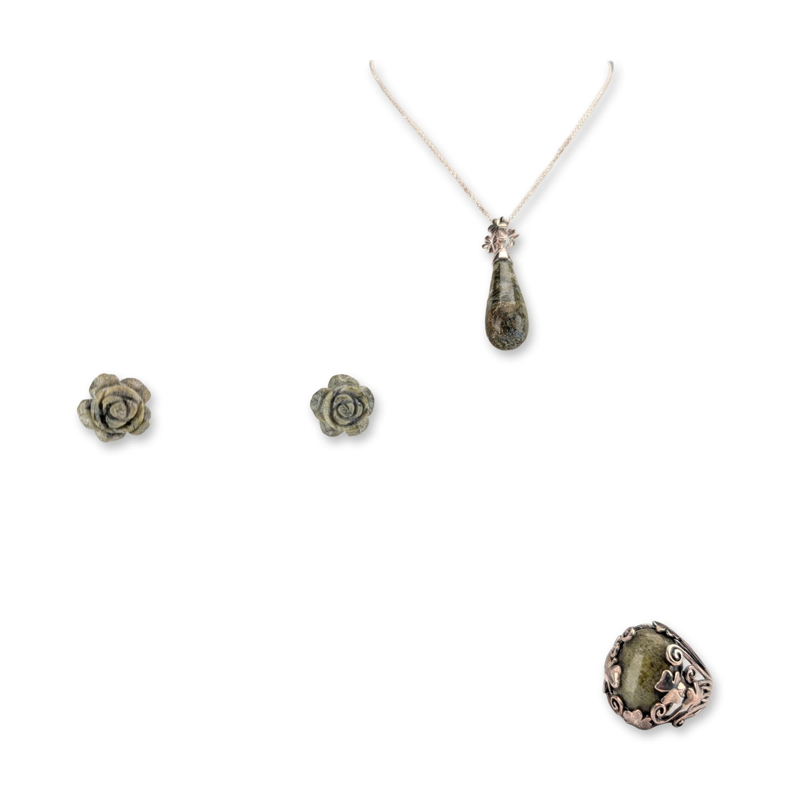 3pc Connemara Marble and Sterling Silver Jewelry: Connemara marble and Sterling silver jewelry collection. The set features a necklace with a polished teardrop pendant suspended from a shamrock-motif bail on a cable-link chain, a ring with an oval ca