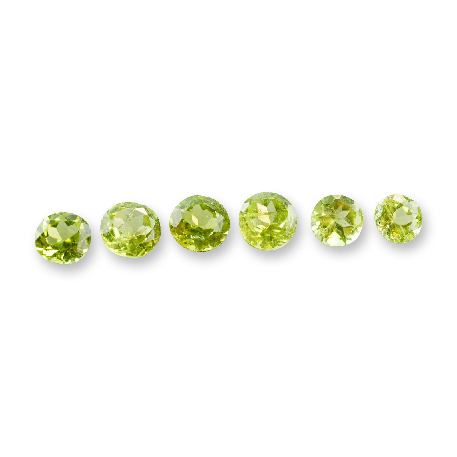 6pc Green Round Peridot Gemstones: Beautiful grouping of 6 Peridot stones. A green round peridot is a vibrant, August birthstone renowned for its unique single-color profile-ranging from bright lime to deep olive green.Tested with