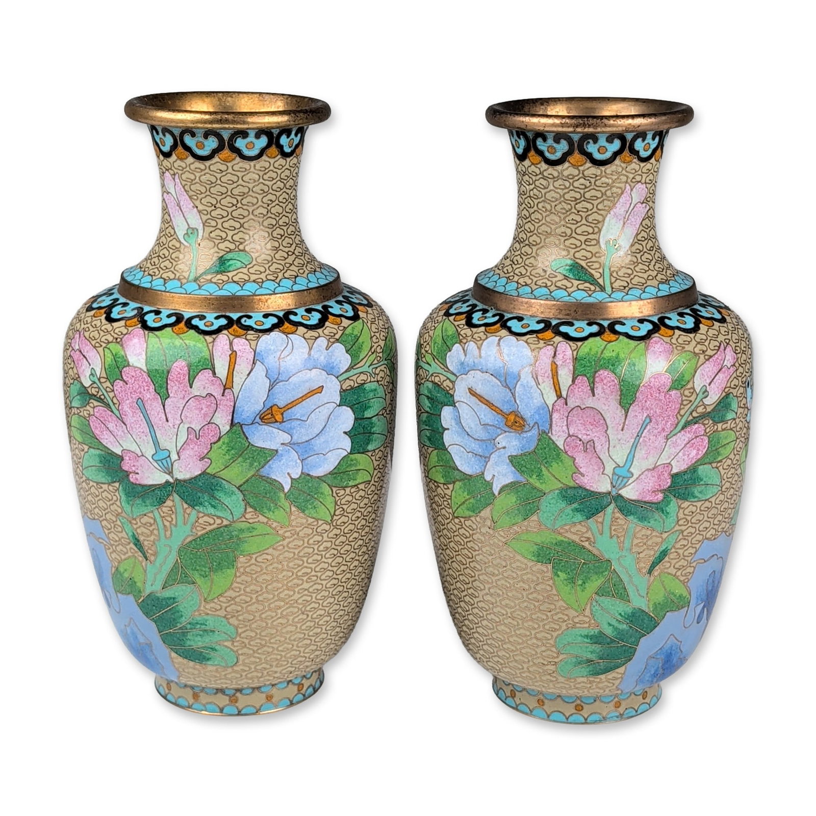 Pair of Chinese Cloisonne Enamel Floral Vases: Chinese, mid-20th century. Pair of ovoid vases in cloisonne enamel on brass, featuring polychrome floral blossoms in shades of pink, blue, and purple among green foliage and a songbird. The decoration