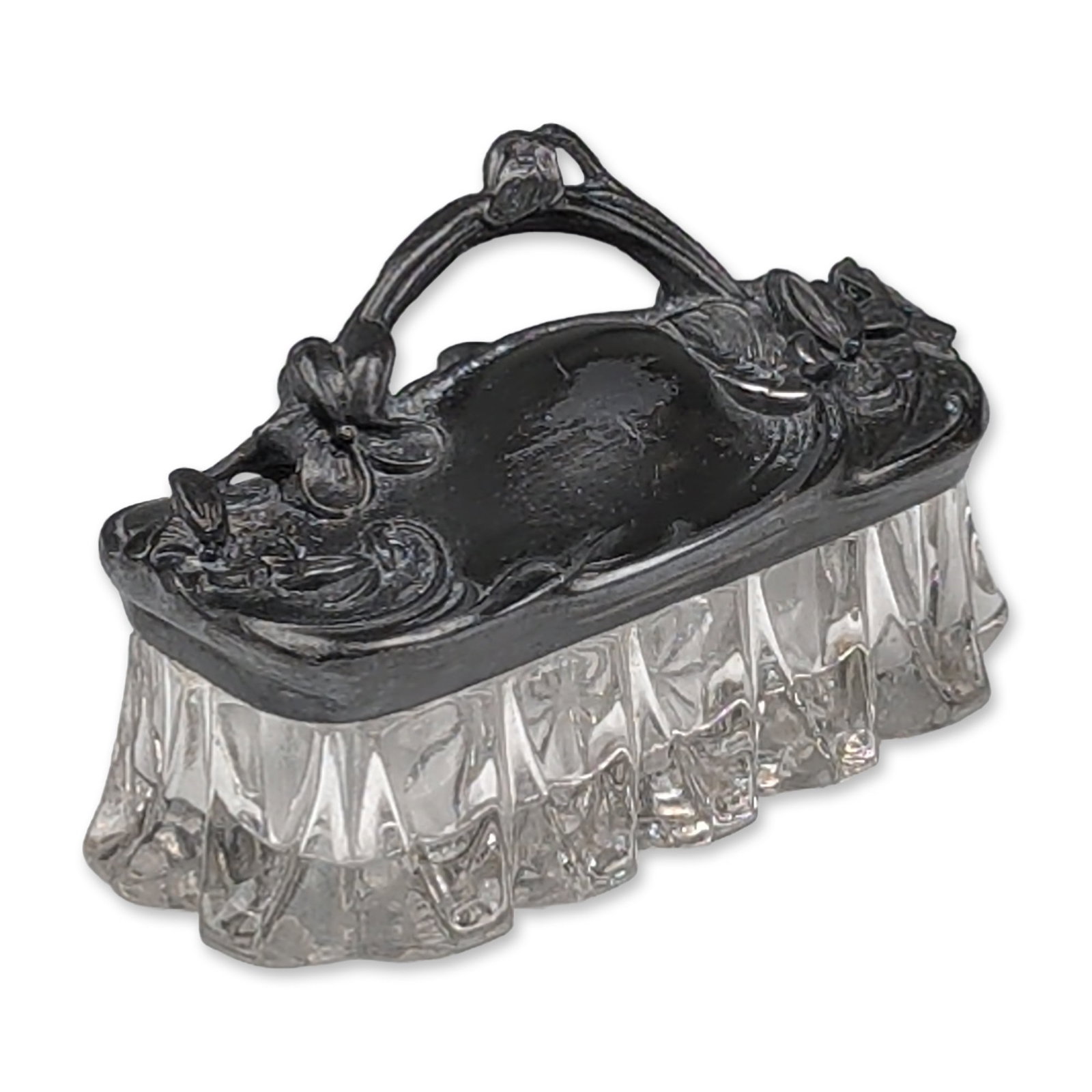 Art Nouveau Glass and Metal Lidded Box: Art Nouveau lidded trinket box featuring a pressed clear glass base and a patinated metal lid. The rectangular glass base has rounded ends with deep vertical fluting and a molded starburst pattern on 