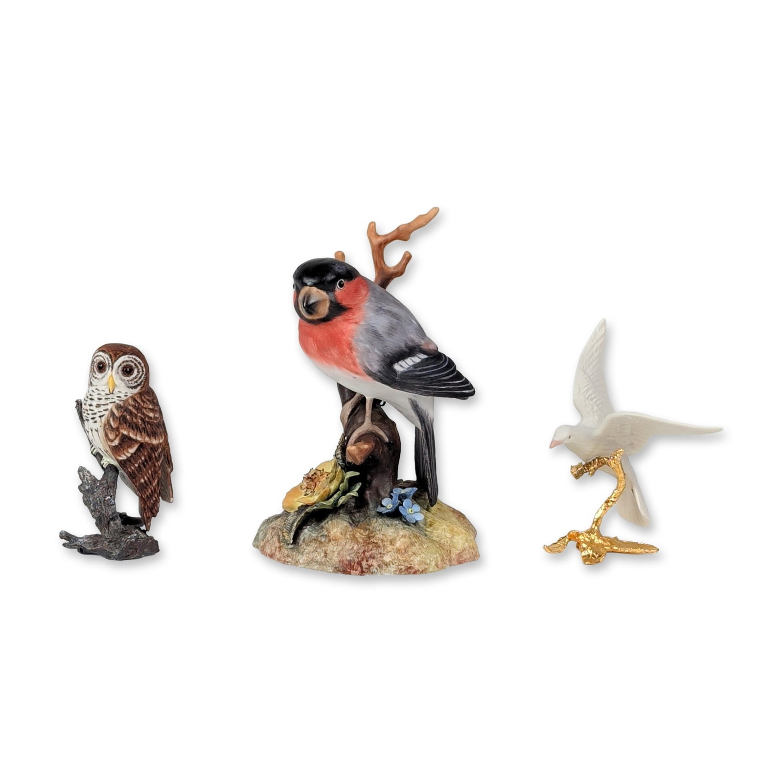 3pc Royal Crown Derby and Boehm Bird Figurines: Royal Crown Derby, Boehm. Trio of hand-painted bird figurines in fine bone china and bisque porcelain. The collection features a Royal Crown Derby bullfinch with a red breast and grey-and-black plumag