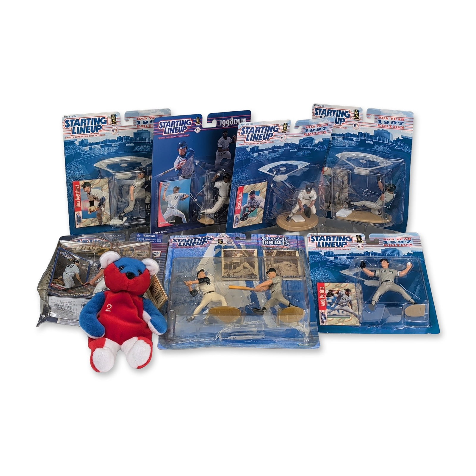 8pc Kenner Starting Lineup New York Yankees Figurine & Salvino's Bammer: Group of eight New York Yankees baseball collectibles featuring figures from the Kenner Starting Lineup series produced between 1997 and 1998. The lot comprises seven action figures in original retail