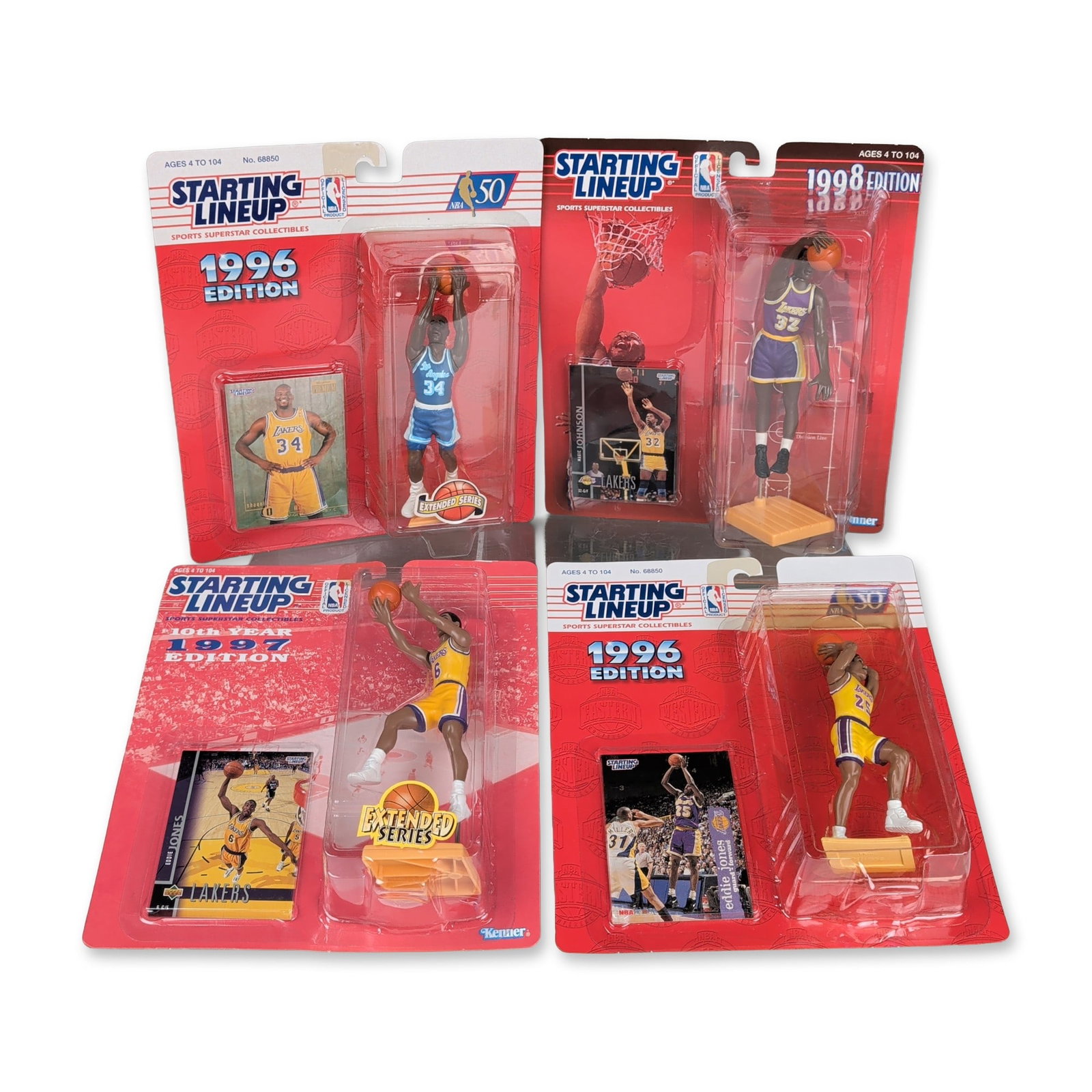 4pc Kenner Starting Lineup Los Angeles Lakers Action Figure Collection: Kenner collection of four Los Angeles Lakers action figures from the Starting Lineup series. The group includes a 1996 Edition Extended Series Shaquille O'Neal in a blue number 34 jersey; a 1998 Editi