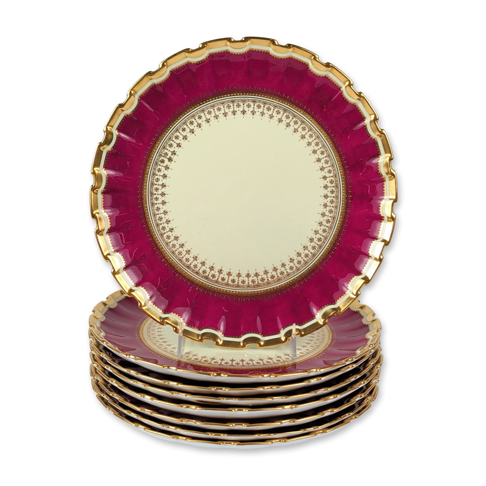 8pc Spode Copeland English Bone China Dessert Plates: English, manufactured by Spode Copeland. Dessert or cabinet plates in fine bone china, featuring a wide claret ground border and heavily scalloped, molded rims with thick gilding. The ivory-colored