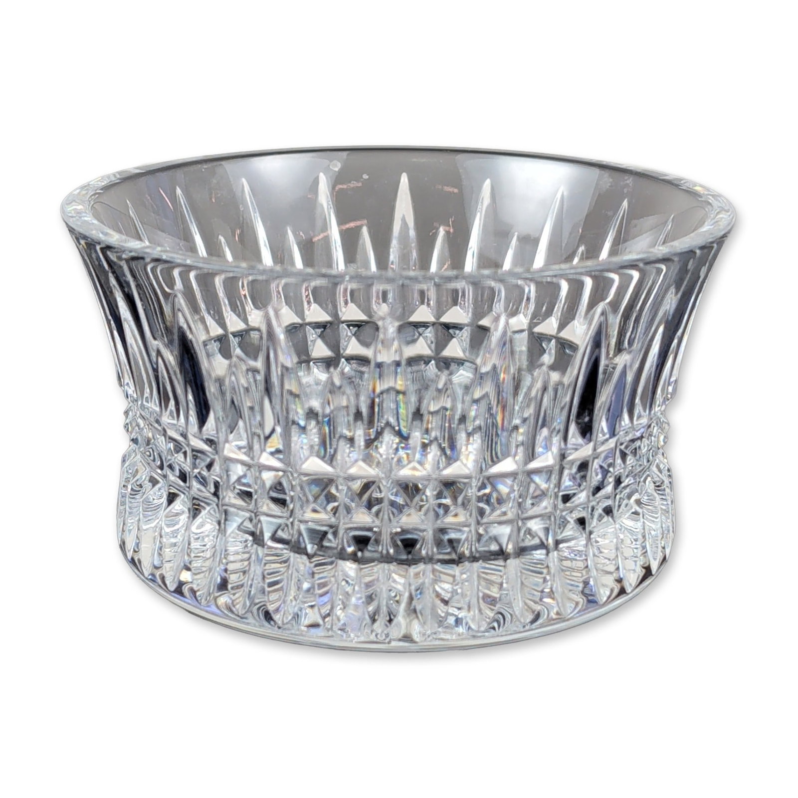 Waterford Lead Crystal Lismore Diamond Nut Bowl: Waterford cut lead crystal vessel, featuring a flared rim and a body decorated with a central band of cross-hatch diamond cuts surmounted by elongated vertical wedge cuts. The thick base is finished w