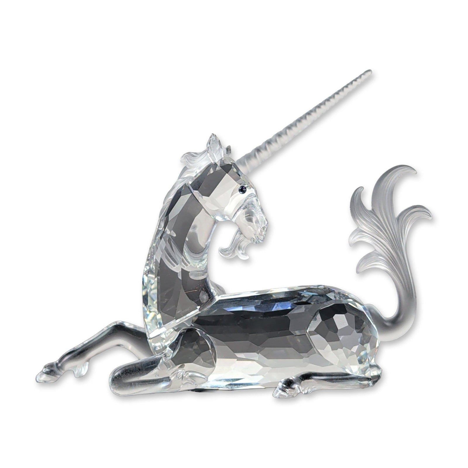 Swarovski 1996 SCS Crystal Unicorn Figurine: Swarovski 1996 SCS annual edition crystal figurine titled The Unicorn, designed by Martin Zendron as the final installment of the Fabulous Creatures trilogy. The piece is constructed with a faceted
