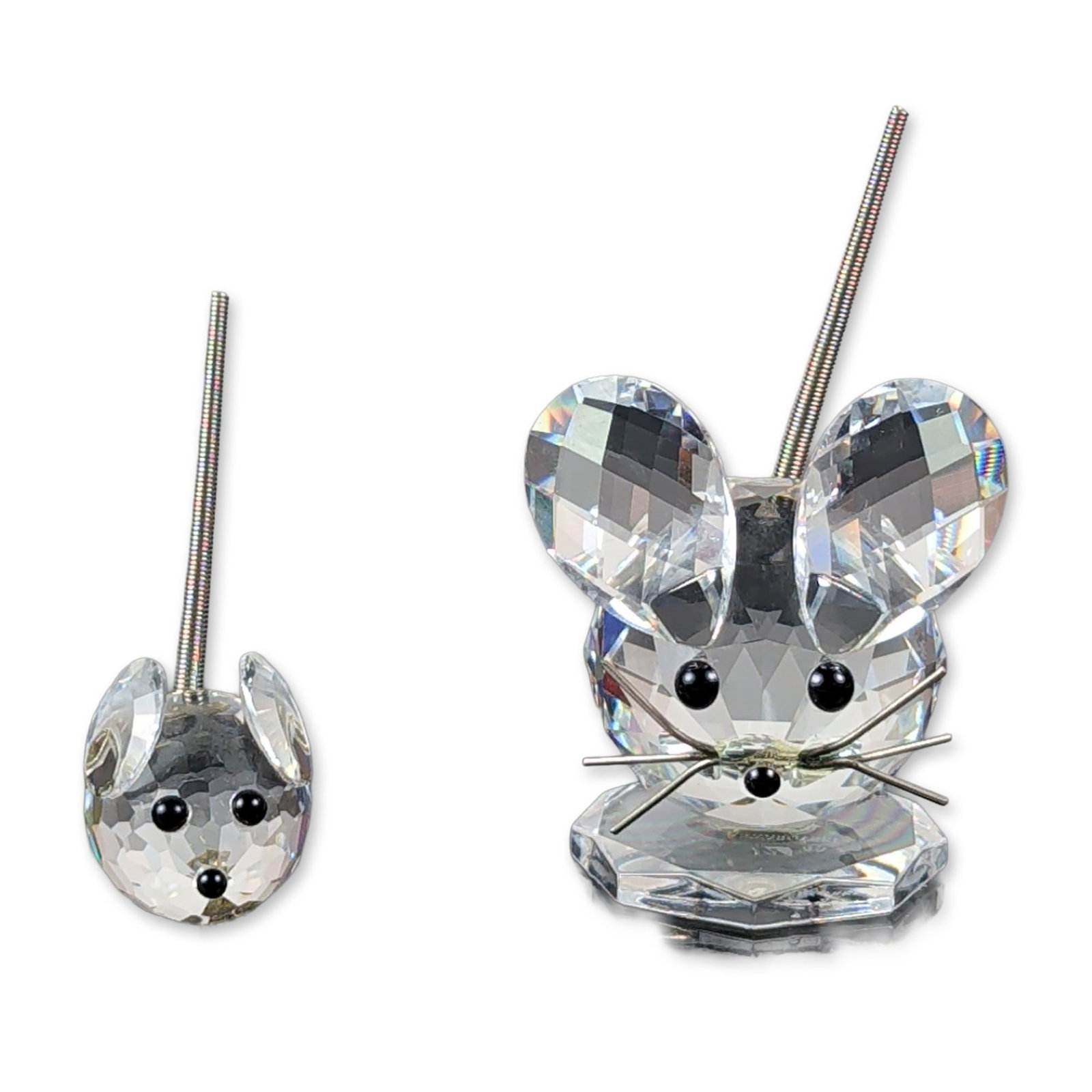 2pc Swarovski Silver Crystal Mouse Figurines: Swarovski faceted clear lead crystal mouse figurines from the Silver Crystal collection. The larger figurine features a faceted globular body, two round faceted ears, six thin metal wire whiskers, and