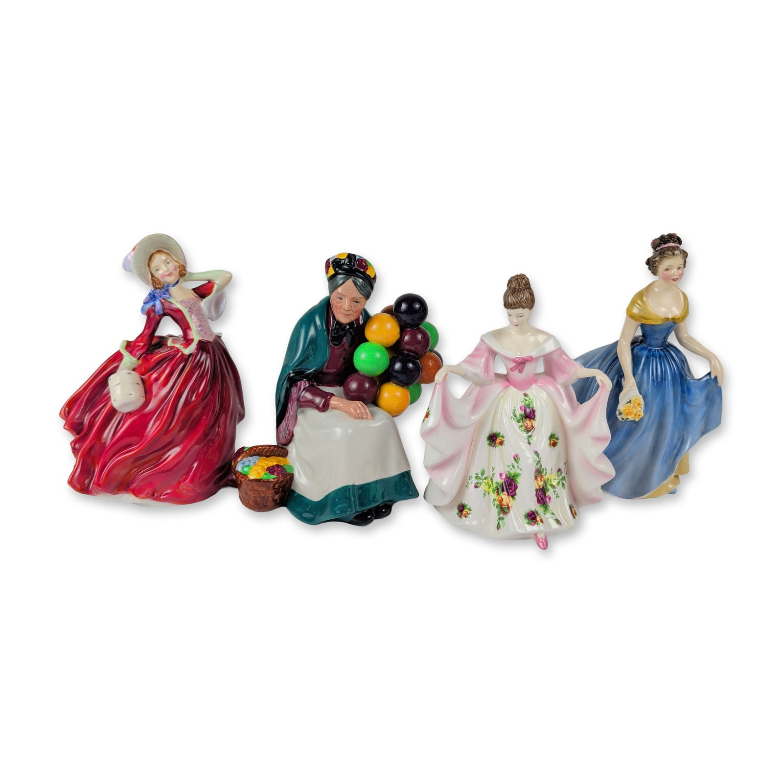 4pc Royal Doulton Porcelain Figurines: Royal Doulton, England. Collection of four glazed bone china figurines, including model numbers HN 2271 (Melanie), HN 4948 (Kathryn), HN 1315 (Old Balloon Seller), and HN 1934 (Autumn Breezes). Melani