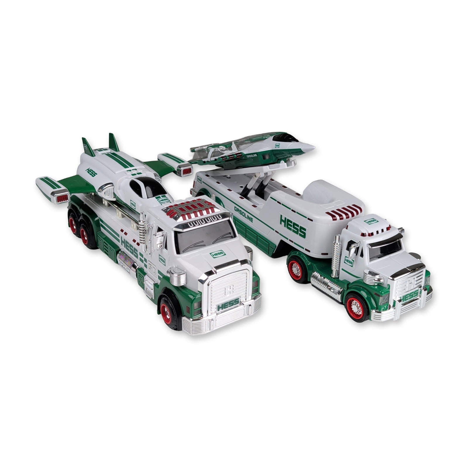 2pc Hess Toy Truck Transports with Jet and Space Cruiser: The 2014 50th Anniversary Space Cruiser with Scout and the 2010 Toy Truck and Jet. Both sets are constructed from molded green and white plastic with chrome-finished accents and rubber tires. The 2014