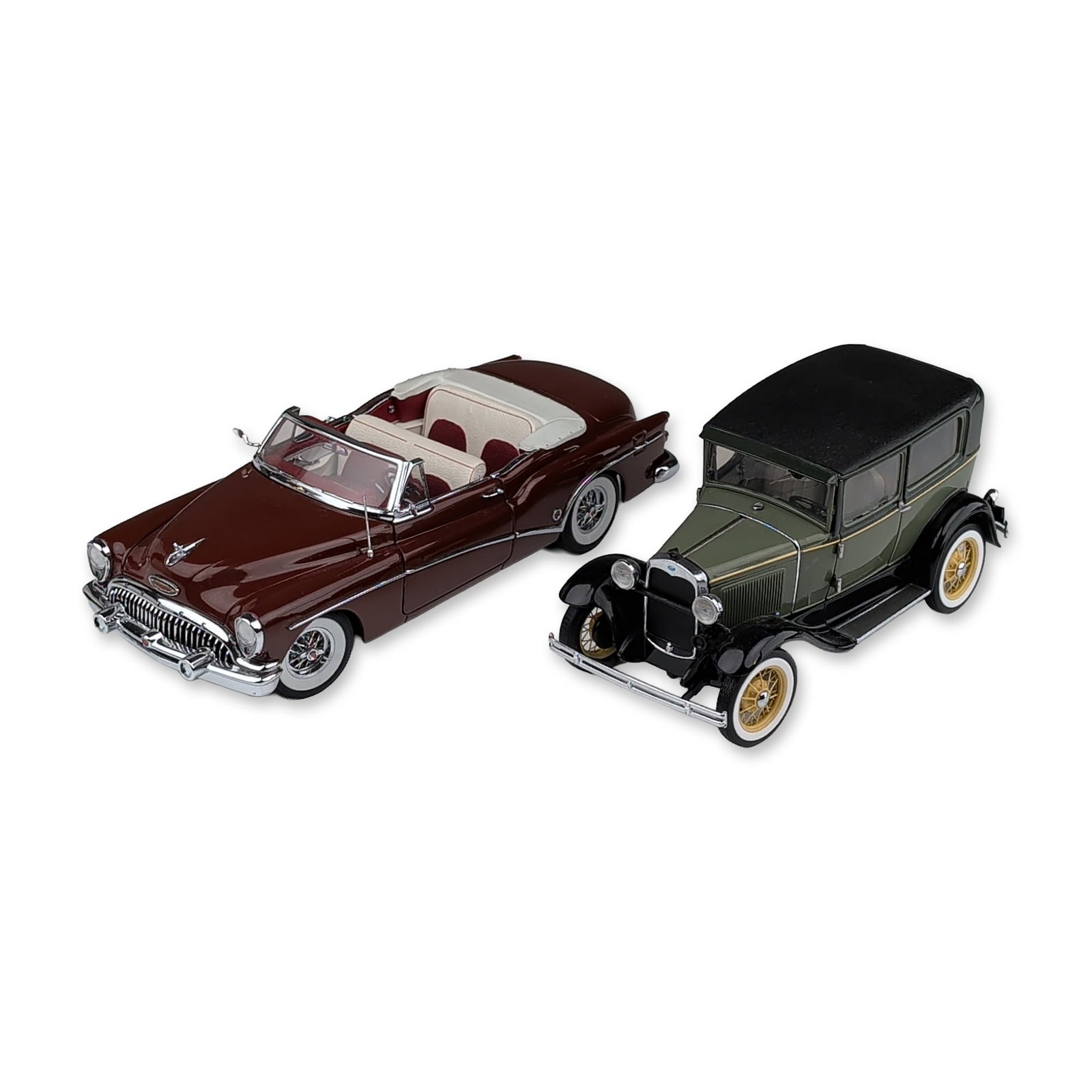 Two Danbury and Franklin Mint Classic Car Replicas: Two 1:24 scale model automobiles in die-cast metal, featuring plastic and rubber components. The first is a 1953 Buick Skylark convertible finished in burgundy with a cream and red interior, featuring