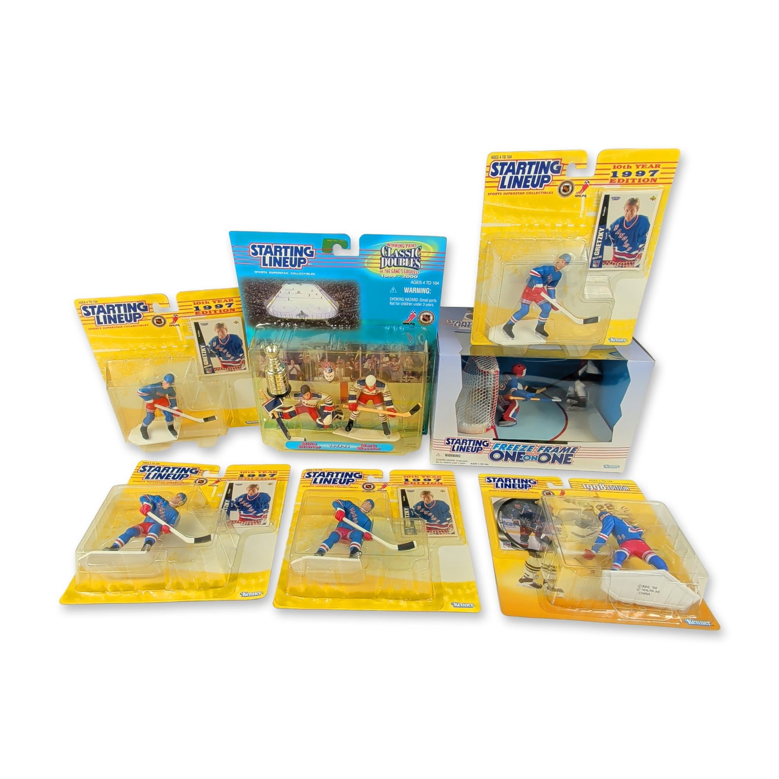8pc NHL Kenner and Hasbro Starting Lineup Action Figure Collection: This collection of vintage sports action figures highlights prominent National Hockey League players in original factory-sealed packaging. The individual Kenner blister packs feature multiple figures 