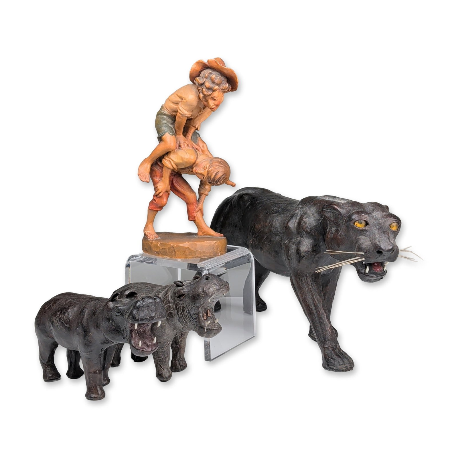 Collection of Four Carved Wood and Leather Figurines (1 of 3)