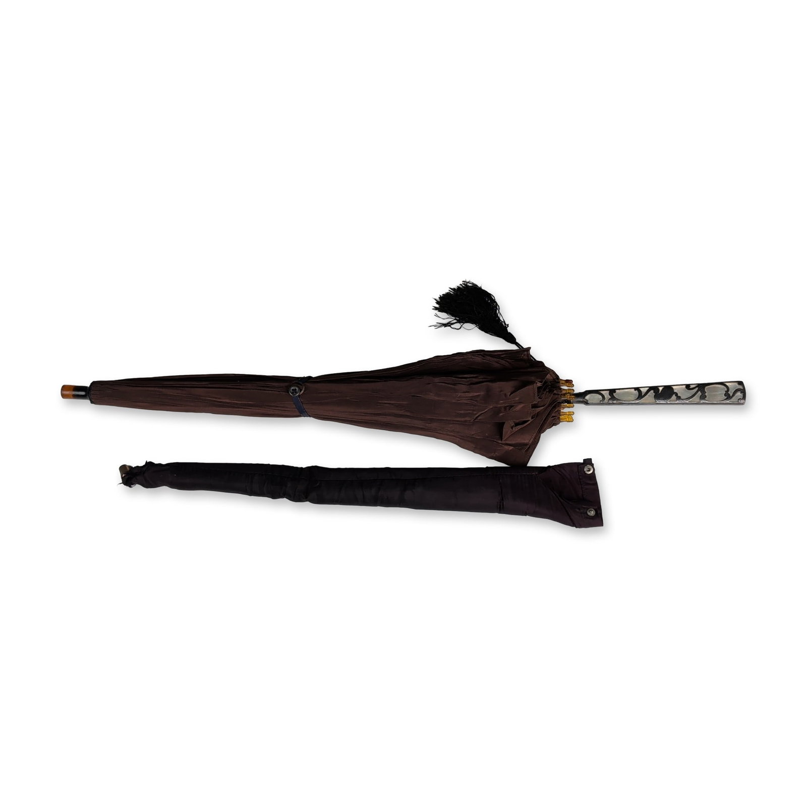 Sterling Silver and Mother-of-Pearl Handled Parasol with Cover: The handle features silver metal openwork in a scrolling foliate pattern, inlaid with iridescent mother-of-pearl panels. A black corded silk tassel is attached to the handle neck. The pleated brown