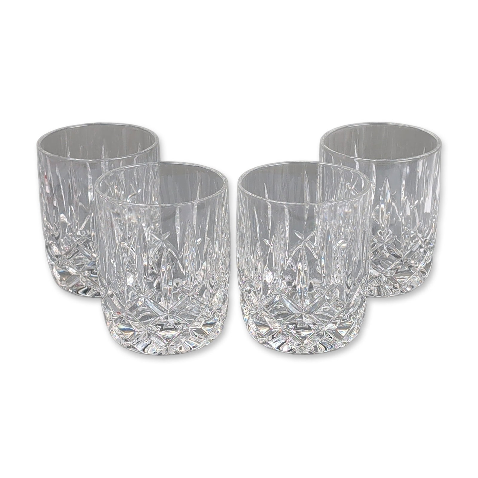 4pc Cut Crystal Double Old-Fashioned Glasses: Set of four double old-fashioned tumblers in cut lead crystal. Each glass features a decorative scheme consisting of deep vertical wedge cuts on the upper body above a wide horizontal band of diamond-
