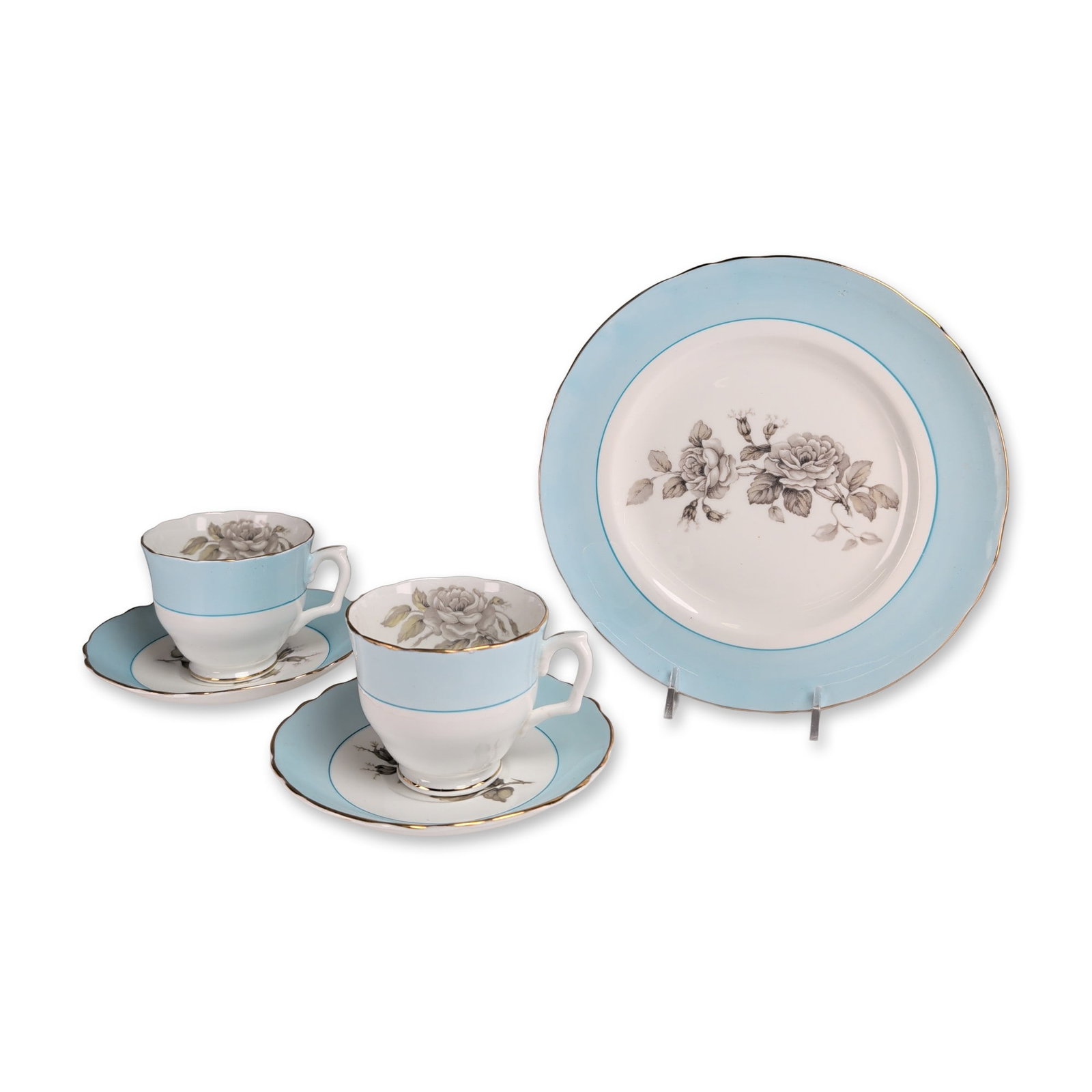 5pc Crown Staffordshire Gray Blossoms Porcelain Tea Service: Crown Staffordshire English fine bone china partial tea service in the Gray Blossoms pattern. The set includes two cups, two saucers, and one dessert plate with powder blue borders and scalloped gold-