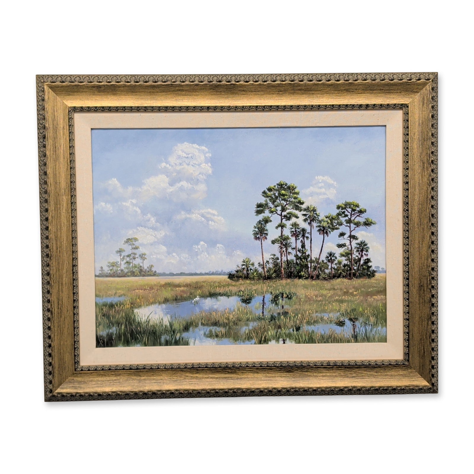 Jackie Brice (American, b. 1935), Everglades Landscape, Oil on Canvas: Jackie Brice (American, b. 1935). Everglades landscape in oil on canvas, featuring a central grouping of Sabal palms and slash pines set within a marshland scene under a bright sky with cumulus