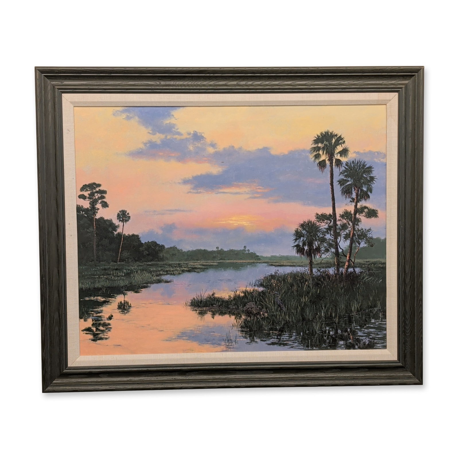Jackie Brice (American, b. 1935), Florida Wetland Landscape at Sunset, Oil on Canvas: Jackie Brice (American, 20th century). Florida wetland landscape at sunset in oil on canvas, featuring Sabal palm trees and marsh grasses reflected in a calm waterway under a pastel sky. Signed and da