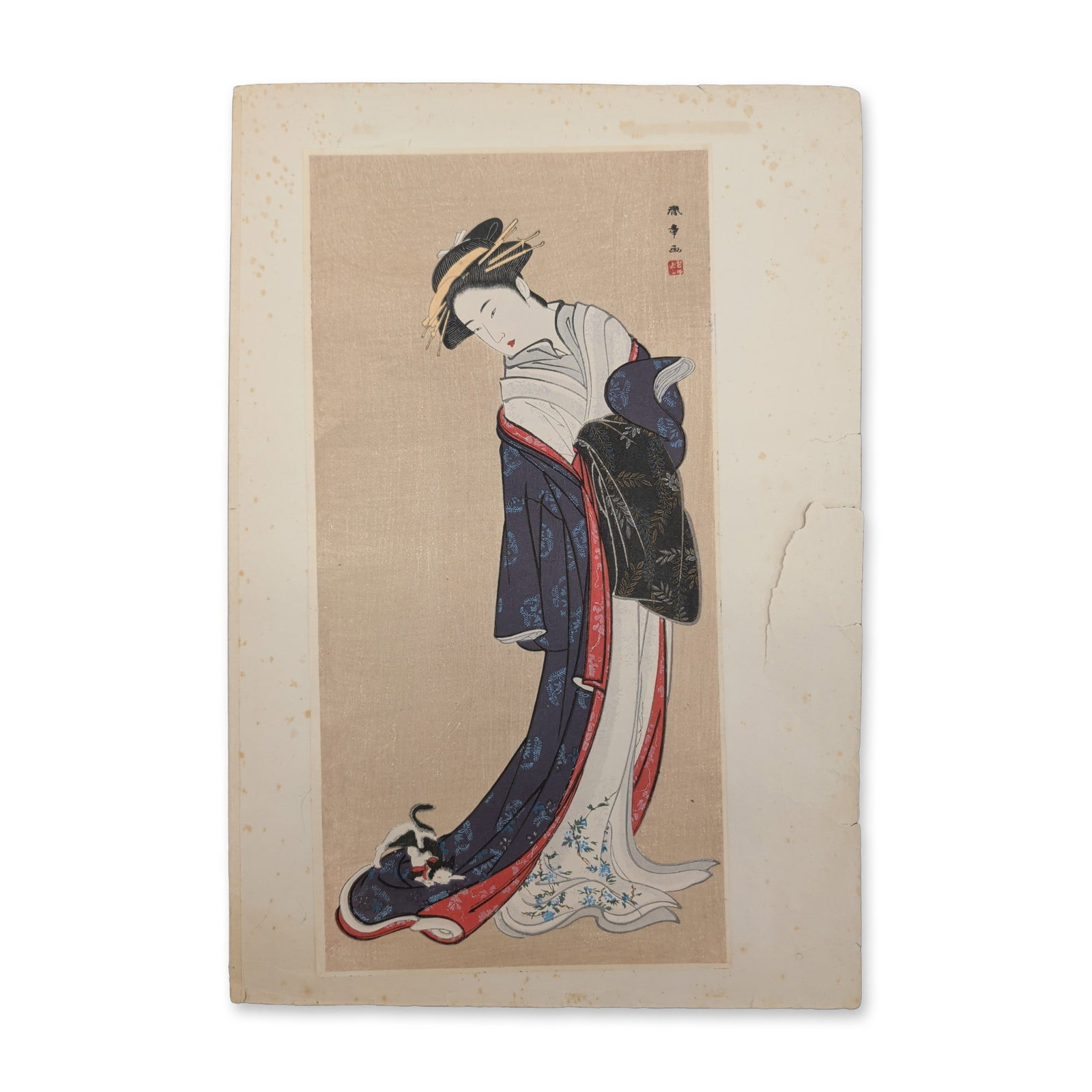 After Katsukawa Shunsho (Japanese 1726-1792) Woodblock Print, A Beauty with a Playing Cat: This 20th-century Showa-era studio striking reproduces a classical late 18th-century composition originally designed by the celebrated ukiyo-e master Katsukawa Shunsho. Based on the typed text and Jap