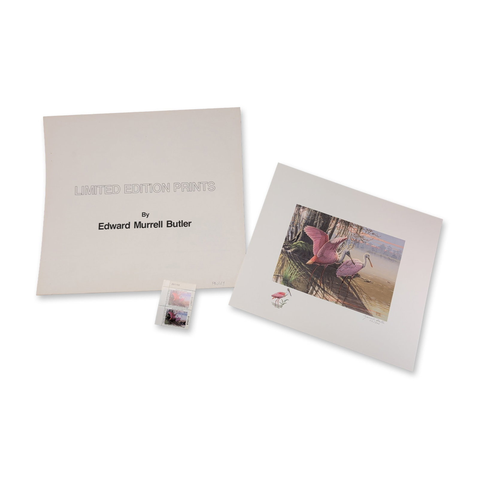 Edward Murrell Butler, Roseate Spoonbills Remarqued Print and Stamps, Signed and Numbered: Edward Murrell Butler (American, 20th century). Limited edition offset lithograph on paper titled Roseate Spoonbills, depicting two birds in a wetland setting at sunset. The print is numbered 59/300 a