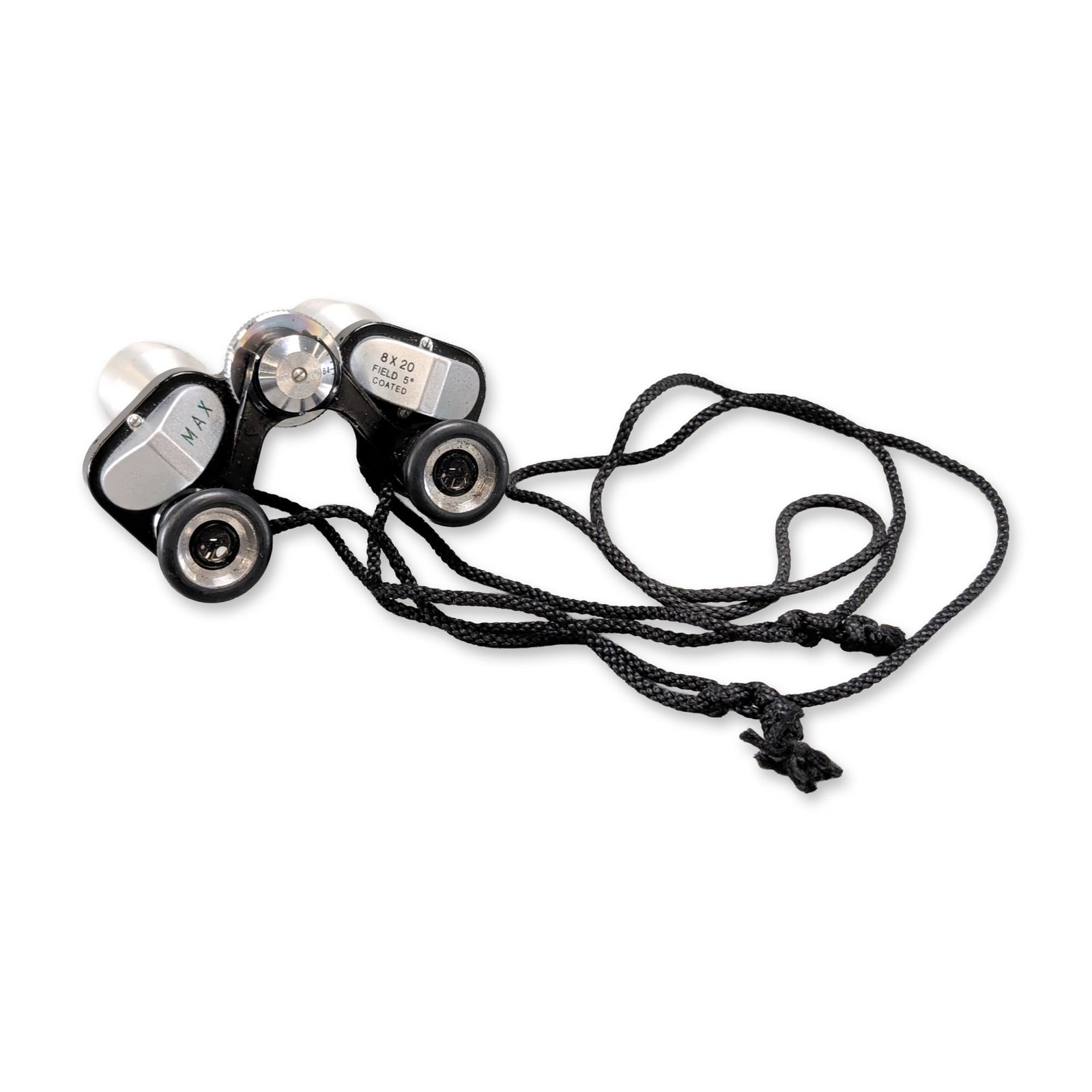 Tasco 8x20 Model 502 Compact Aluminum Binoculars: Compact binoculars in silver-toned aluminum and black enameled metal, featuring 8x20 magnification and a 5-degree field of view. The instrument is constructed with coated optics, a central knurled foc