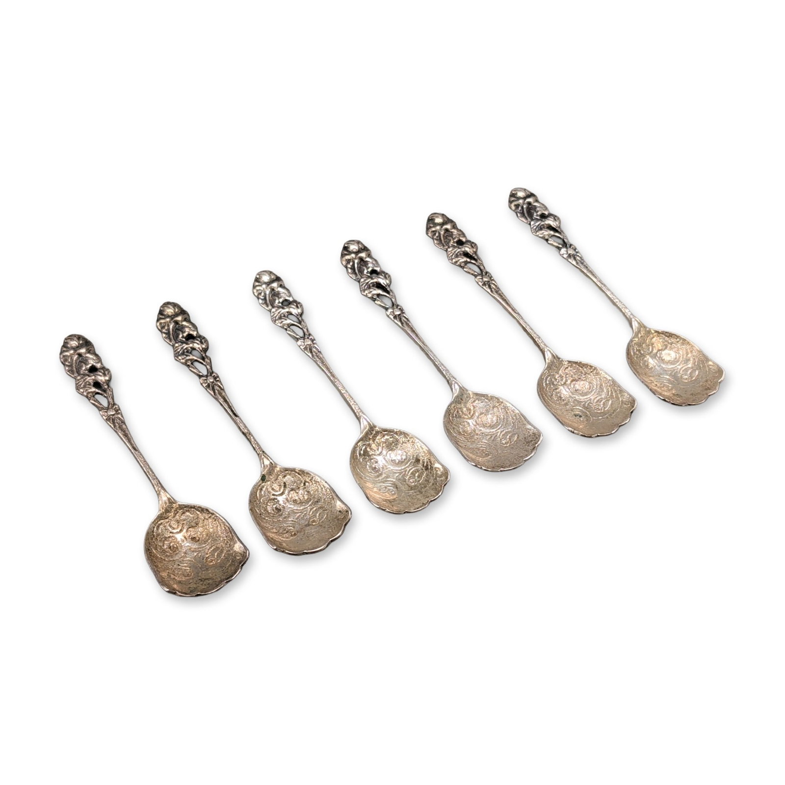 6pc Continental 800 Silver Spoons: Set of six Continental European small spoons in 800 silver, featuring an ornate floral and Rococo revival design. Each spoon is constructed with a pierced openwork handle decorated with roses and foli