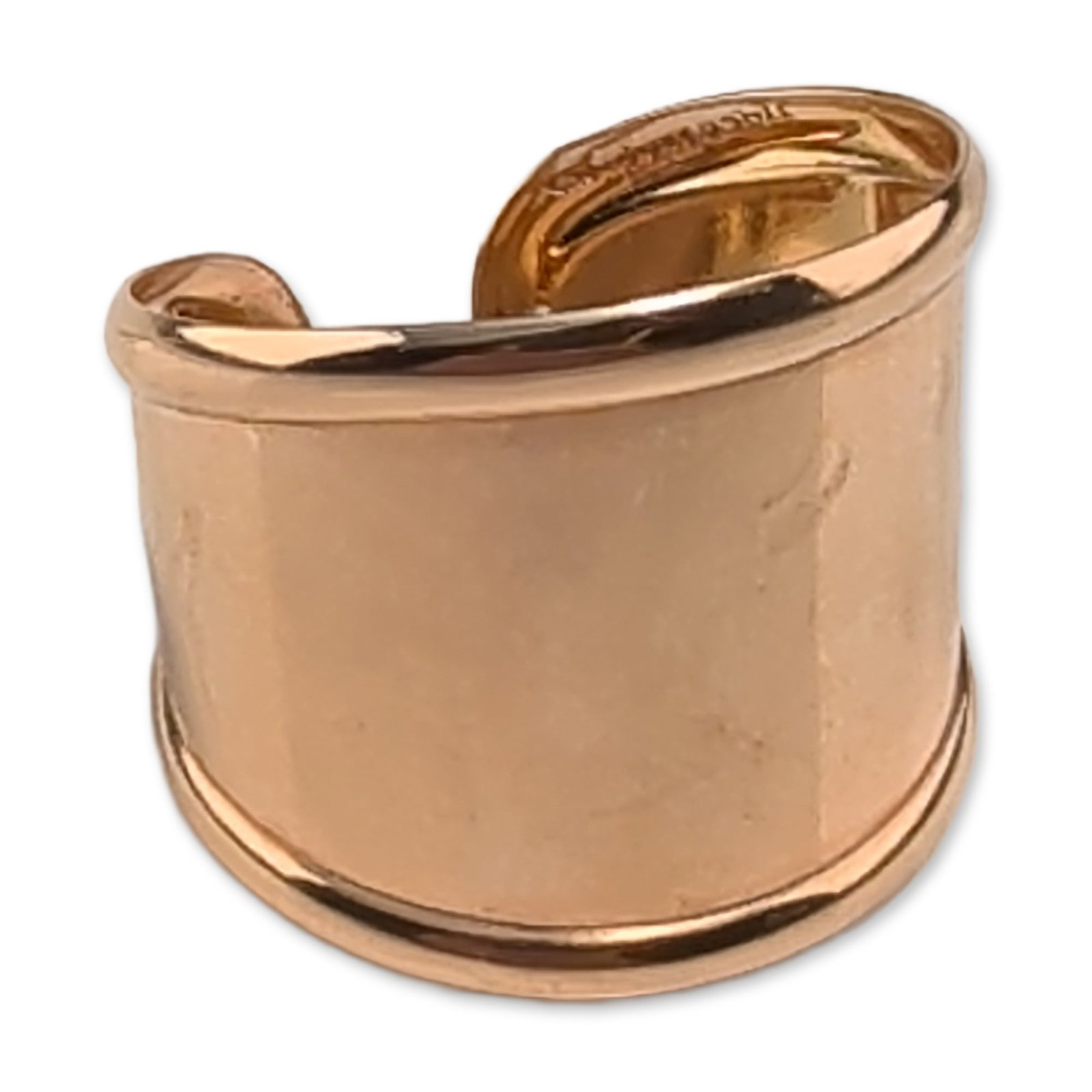 Italian 10K Yellow Gold Cuff Ring: Italian cuff ring in 10k yellow gold, featuring a wide, open-back band with a concave center and raised polished borders. Stamped ITALY 10K on the interior rim.Ring size: 8 (adjustable). Dimensions: 1