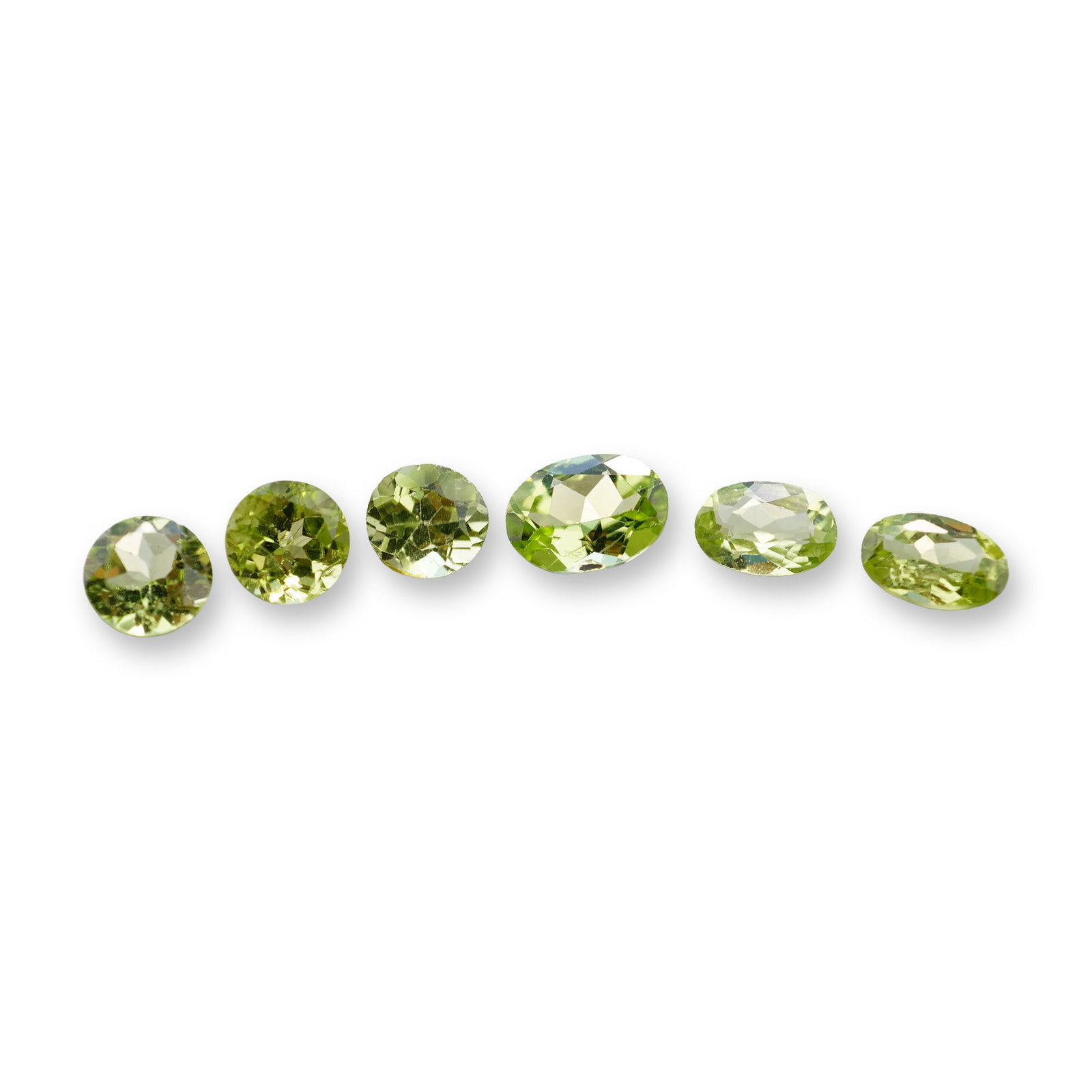 6pc Round and Oval Peridot Gemstones: Beautiful grouping of 6 Peridot stones. A green round peridot is a vibrant, August birthstone renowned for its unique single-color profile-ranging from bright lime to deep olive green.Tested with