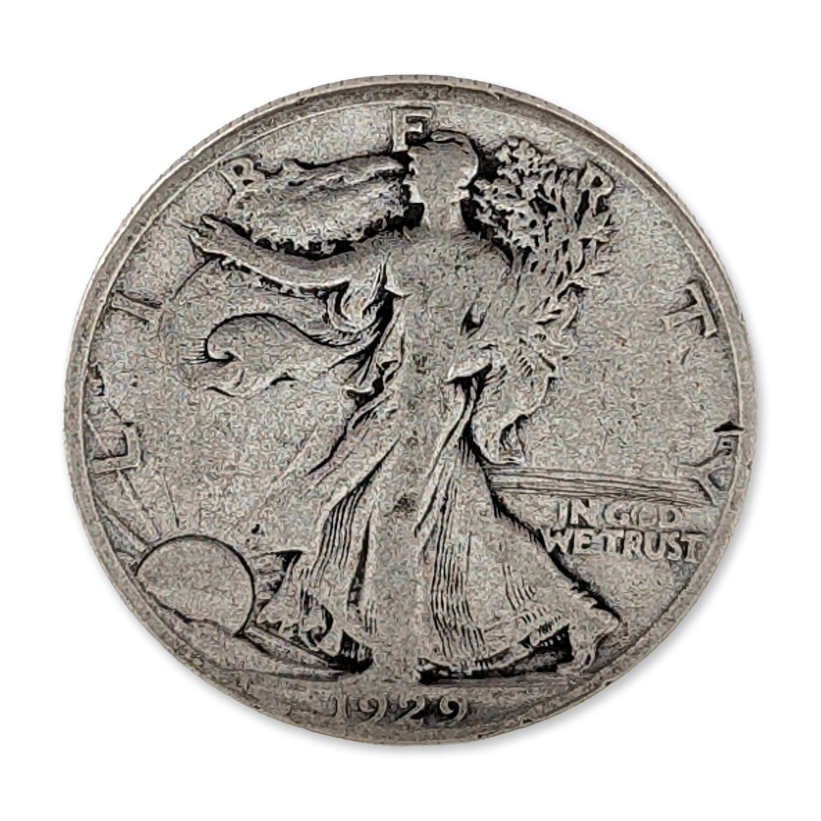 1929-S US Walking Liberty Silver Half Dollar Coin: Struck at the San Francisco Mint, the coin features the Walking Liberty design on the obverse and a bald eagle on the reverse. Composition is 90 percent silver and 10 percent copper. The obverse conta