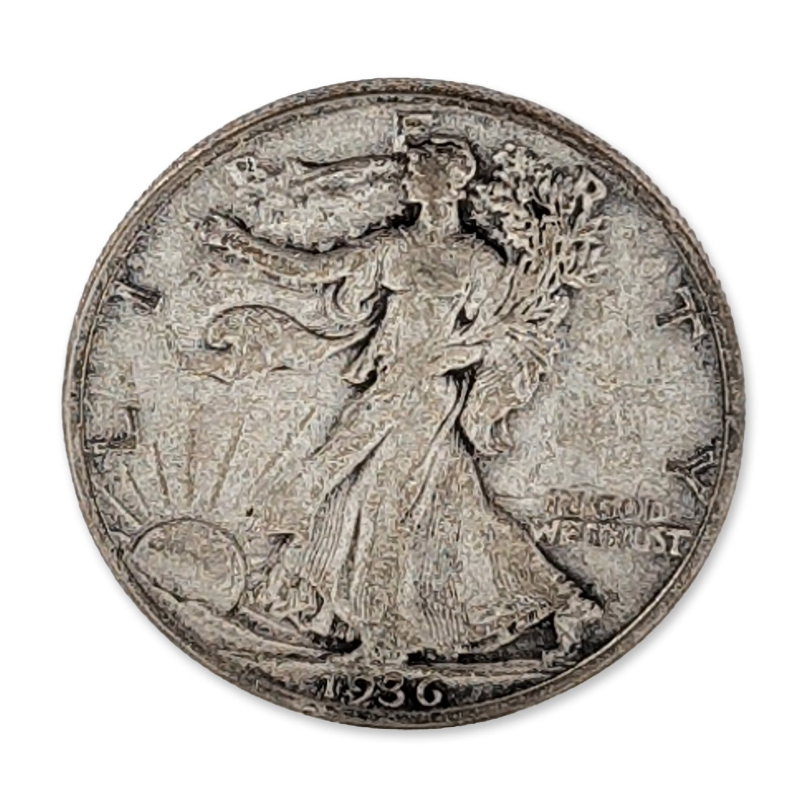 1936 US Silver Walking Liberty Half Dollar Coin: 1936 US Walking Liberty half dollar, minted in Philadelphia. Composed of 90 percent silver. The obverse features the Walking Liberty design with the date 1936 struck at the bottom, the word LIBERTY ar