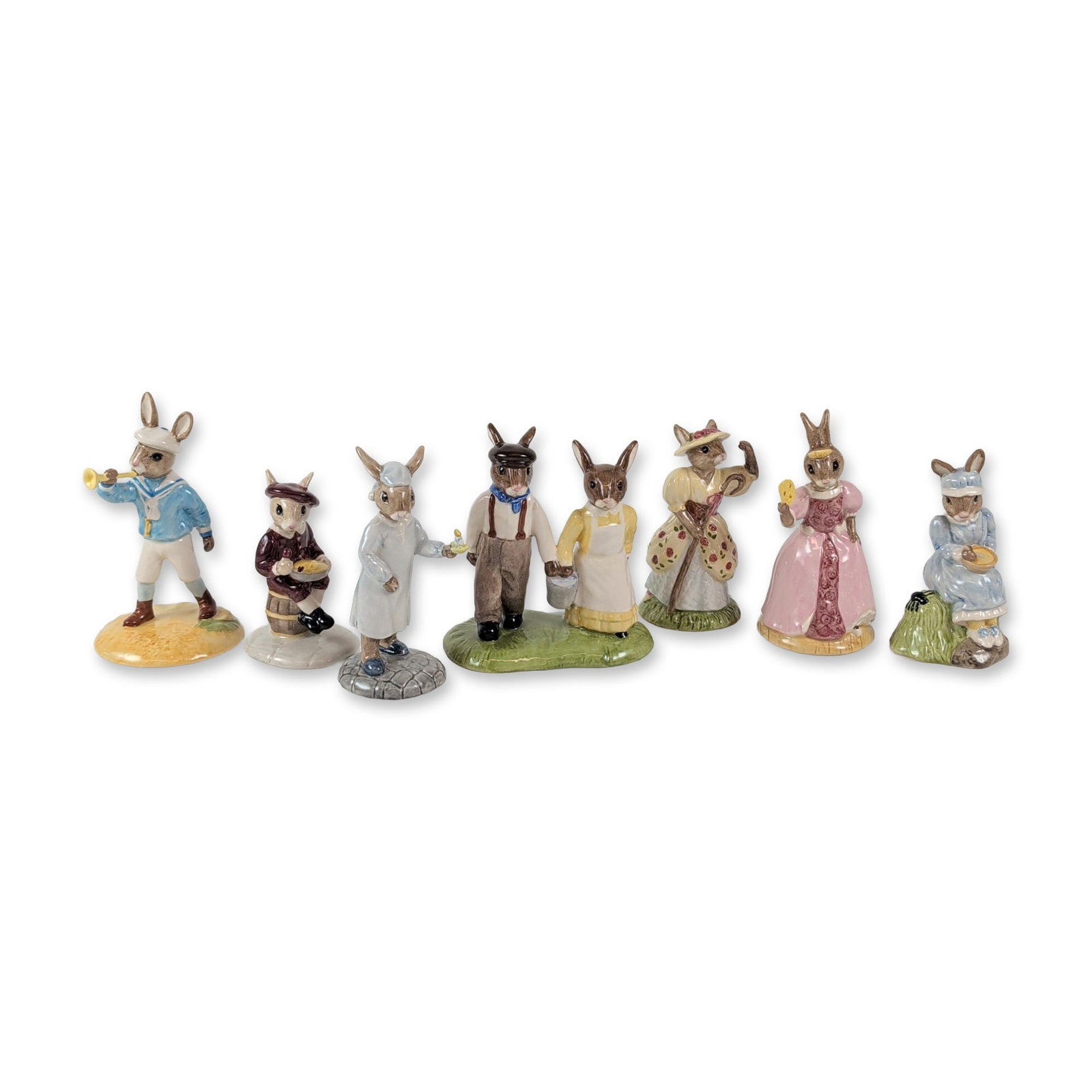 Royal Doulton Bunnykins Porcelain Character Figurines: Royal Doulton. Collection of seven porcelain figurines from the Bunnykins series, featuring hand-decorated characters based on nursery rhymes and fairy tales. The group includes Cinderella (DB 231), L